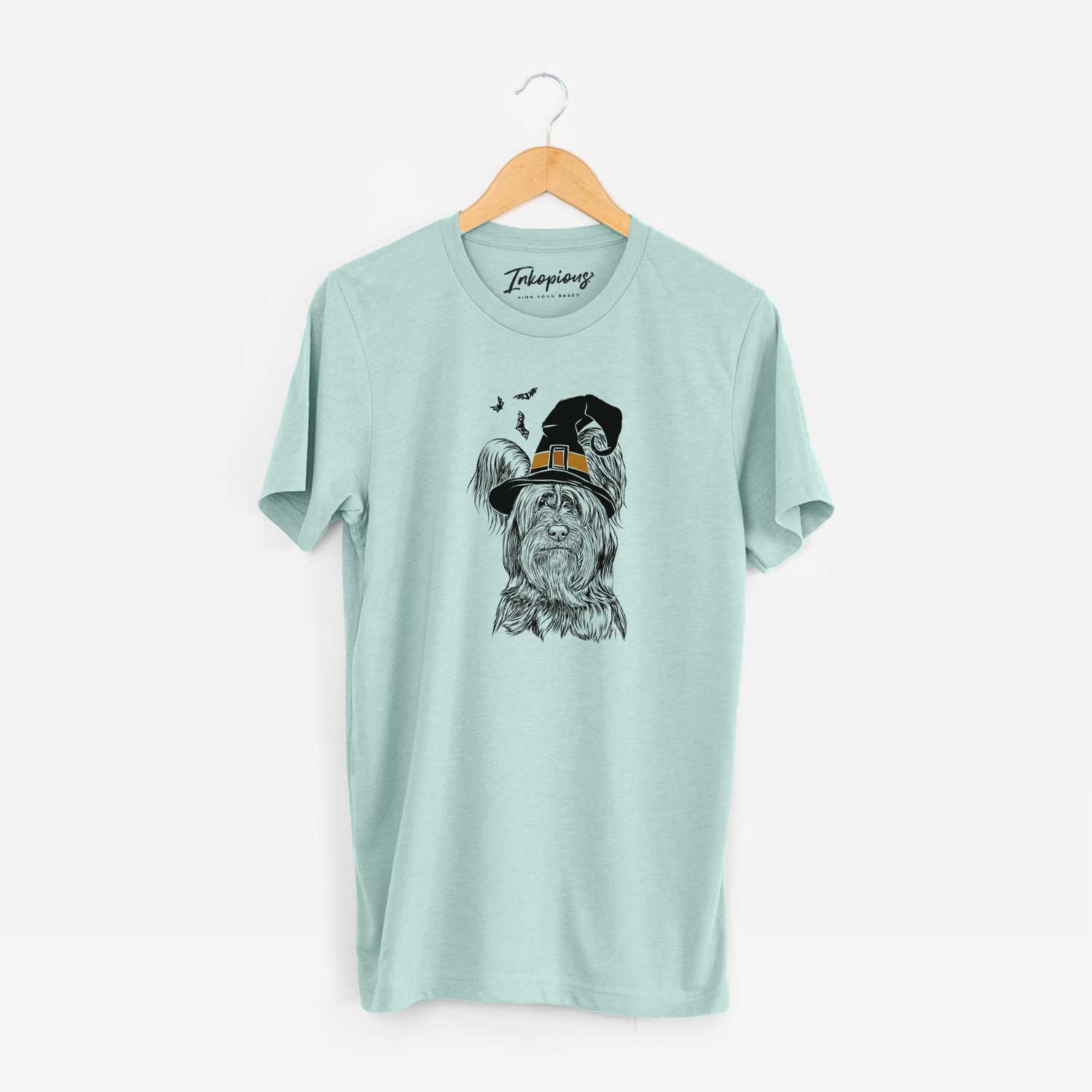 Hand-drawn sketch of Bandit the Skye Terrier wearing a witch hat on a Heather Sage Unisex crewneck