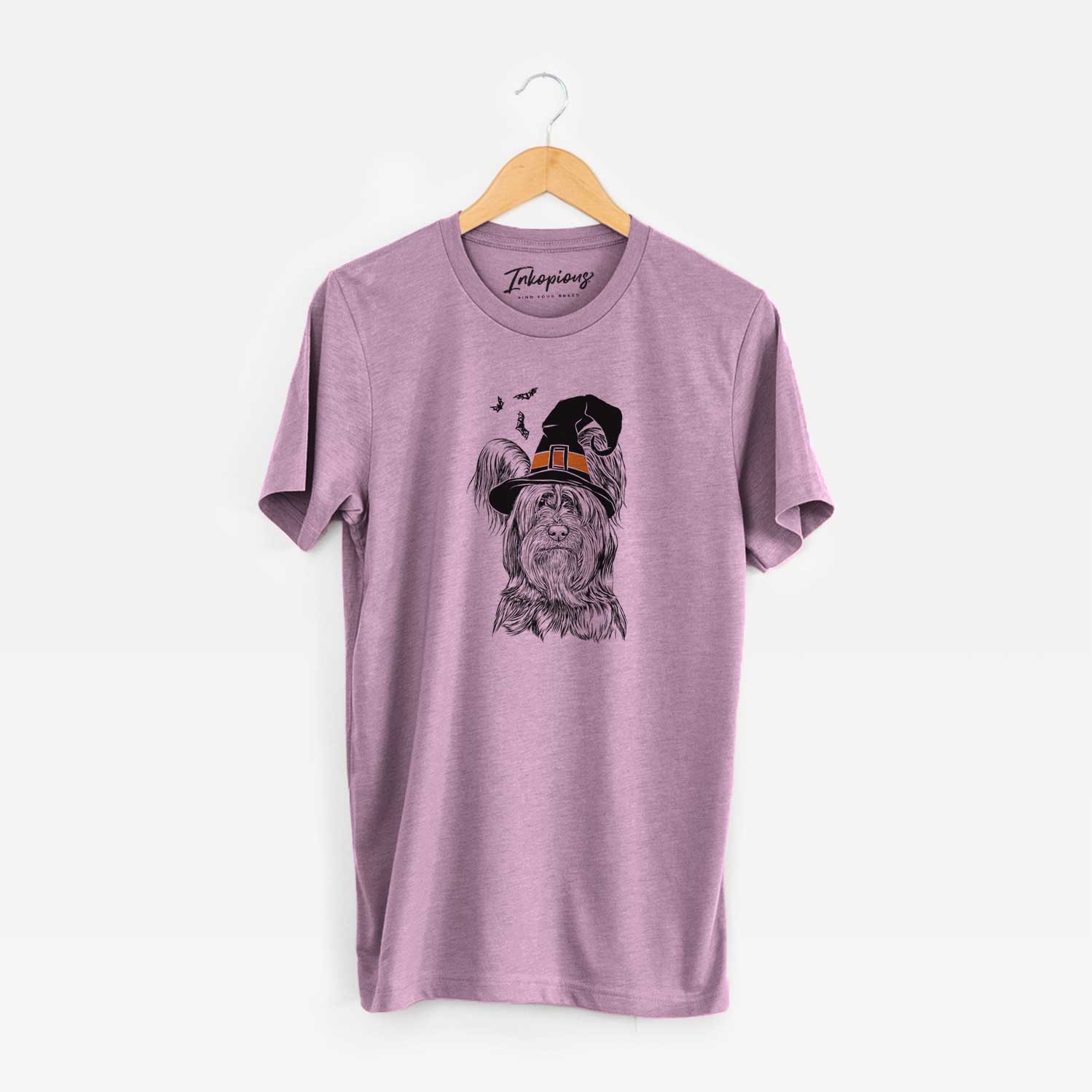 Hand-drawn sketch of Bandit the Skye Terrier wearing a witch hat on an Orchid Unisex crewneck