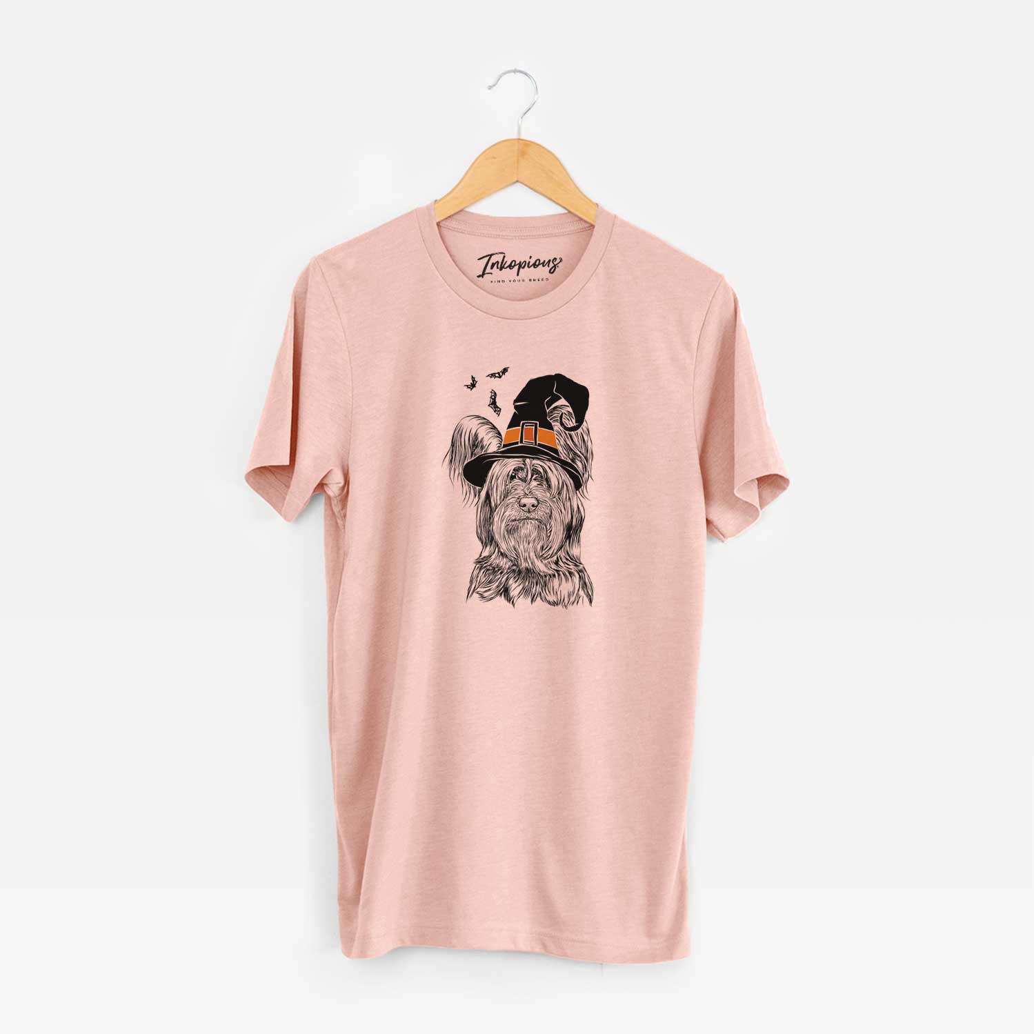 Hand-drawn sketch of Bandit the Skye Terrier wearing a witch hat on a Peach Unisex crewneck