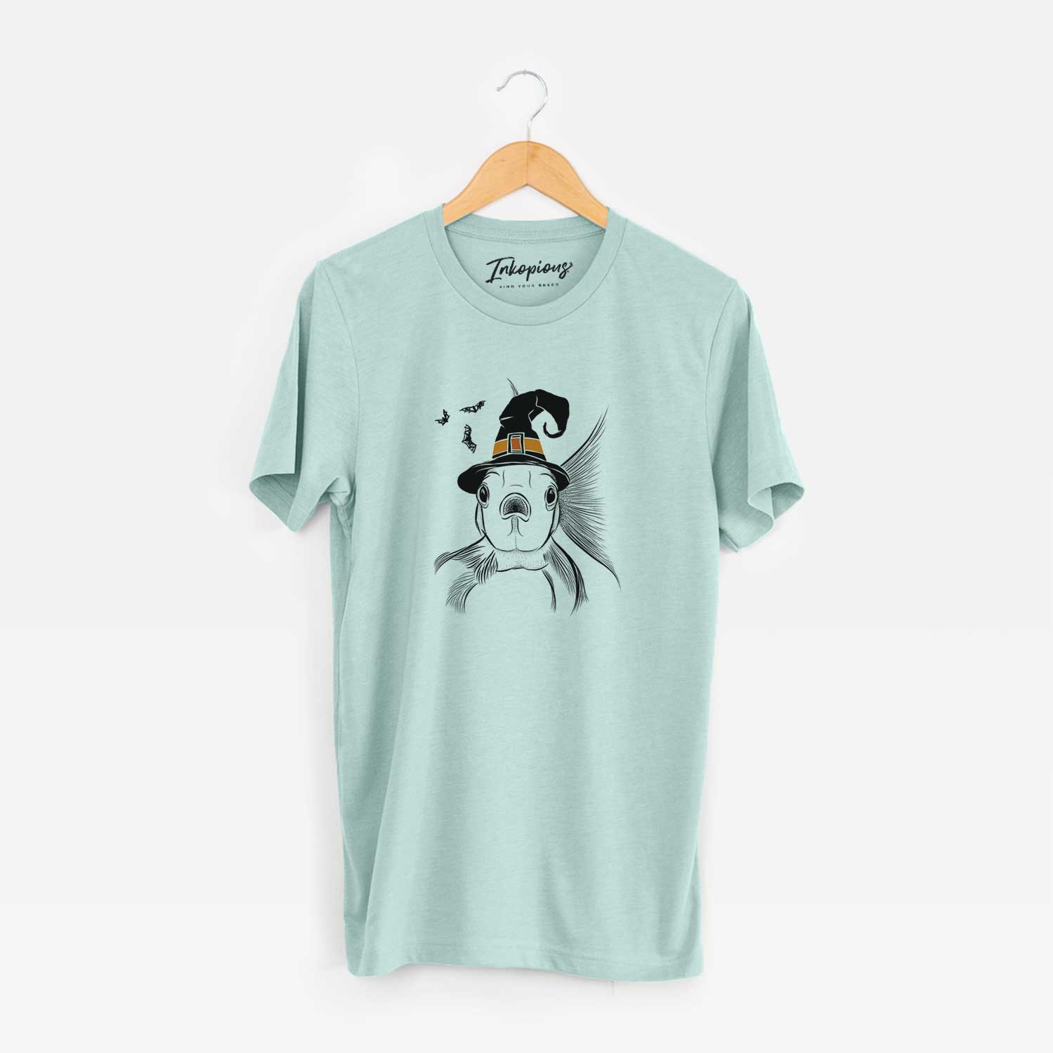 Hand-drawn sketch of Beefcake the Goldfish wearing a witch hat on a Heather Sage Unisex crewneck
