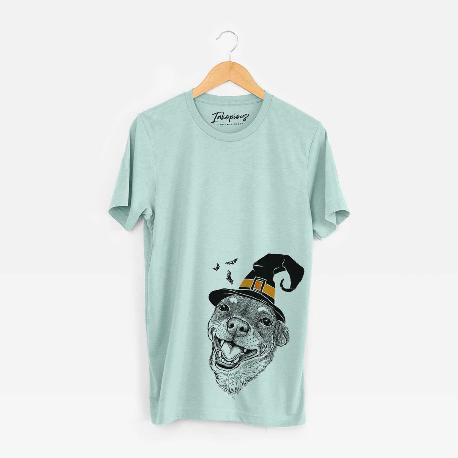 Hand-drawn sketch of Boss the Chihuahua wearing a witch hat on a Heather Sage Unisex crewneck