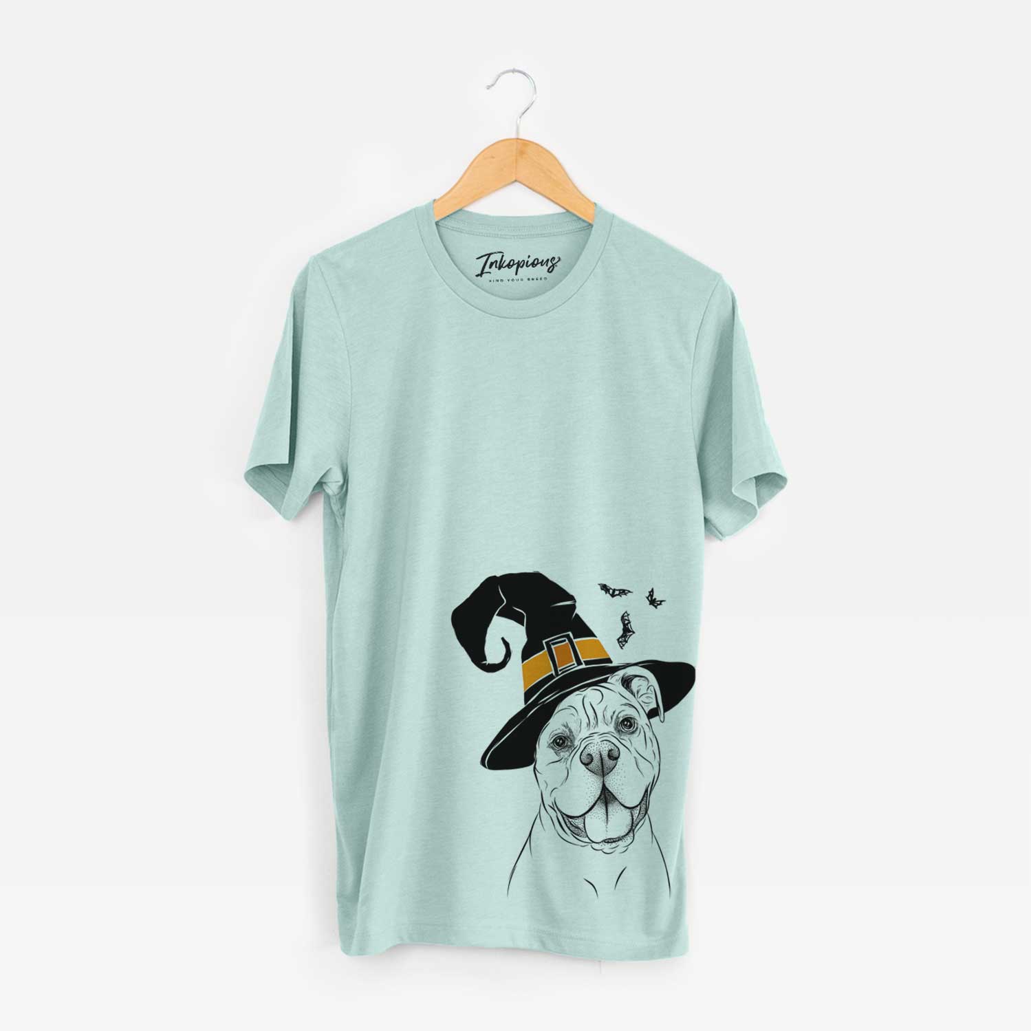 Hand-drawn sketch of Bravo the Bulldog Mix wearing a witch hat on a Heather Sage Unisex crewneck