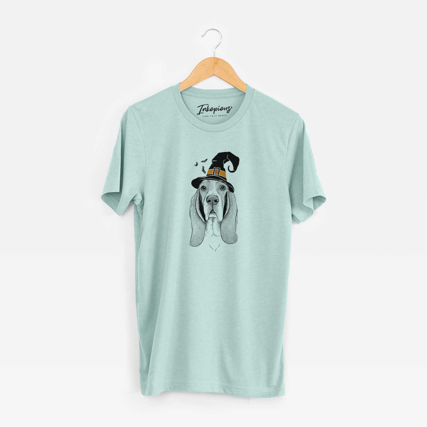 Hand-drawn sketch of Buckley the Basset Hound wearing a witch hat on a Heather Sage Unisex crewneck