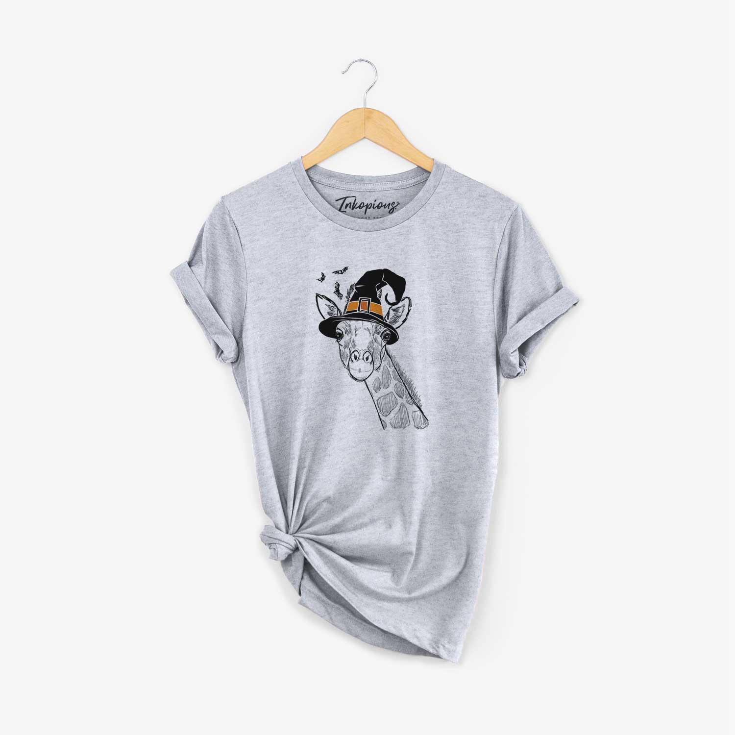 Hand-drawn sketch of Cedrick the Giraffe wearing a witch hat on a Grey Unisex crewneck