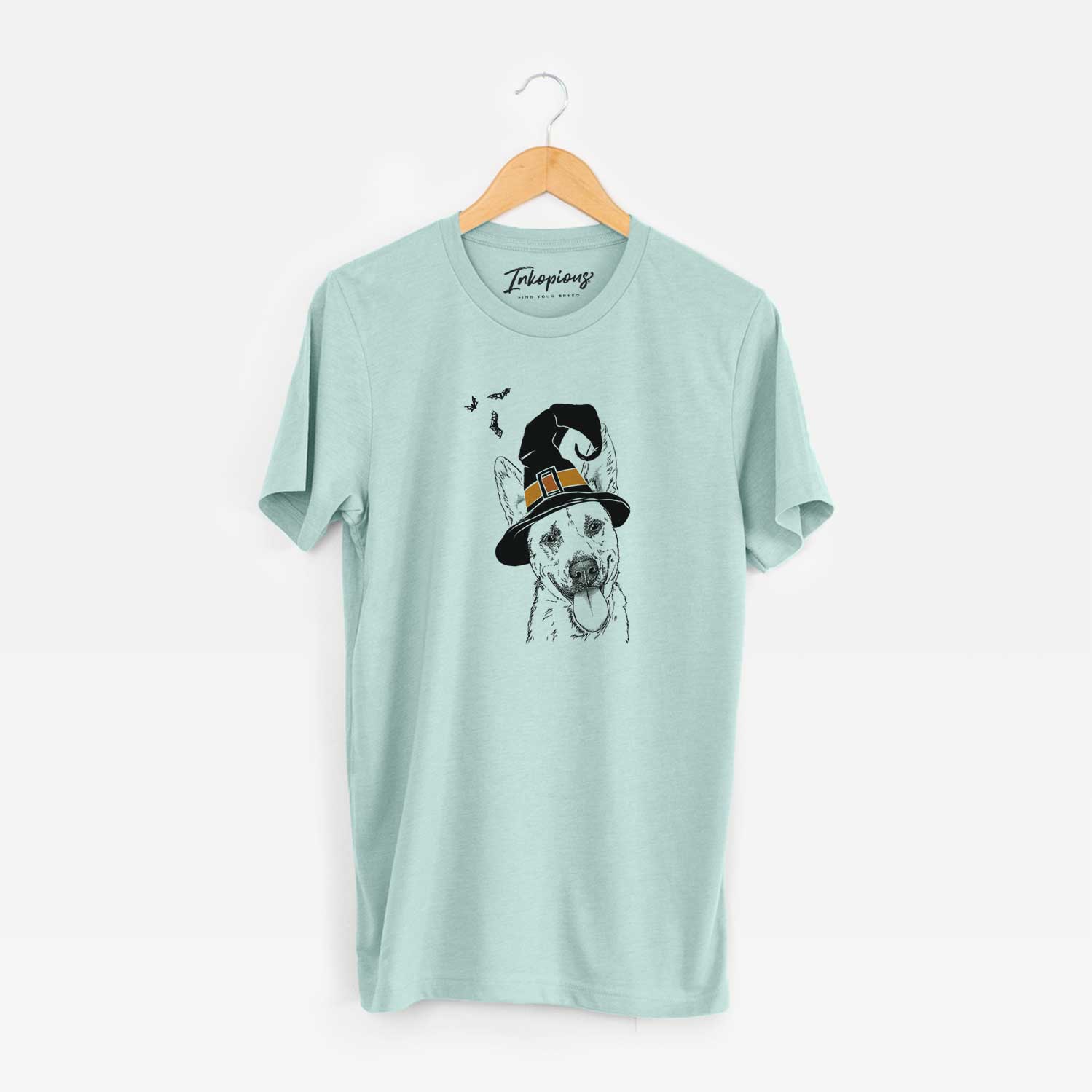 Hand-drawn sketch of Charlie the Mixed Breed wearing a witch hat on a Heather Sage Unisex crewneck