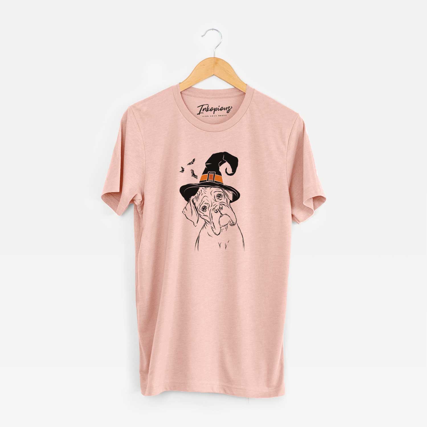 Hand-drawn sketch of Cooper the Boxer wearing a witch hat on a Peach Unisex crewneck