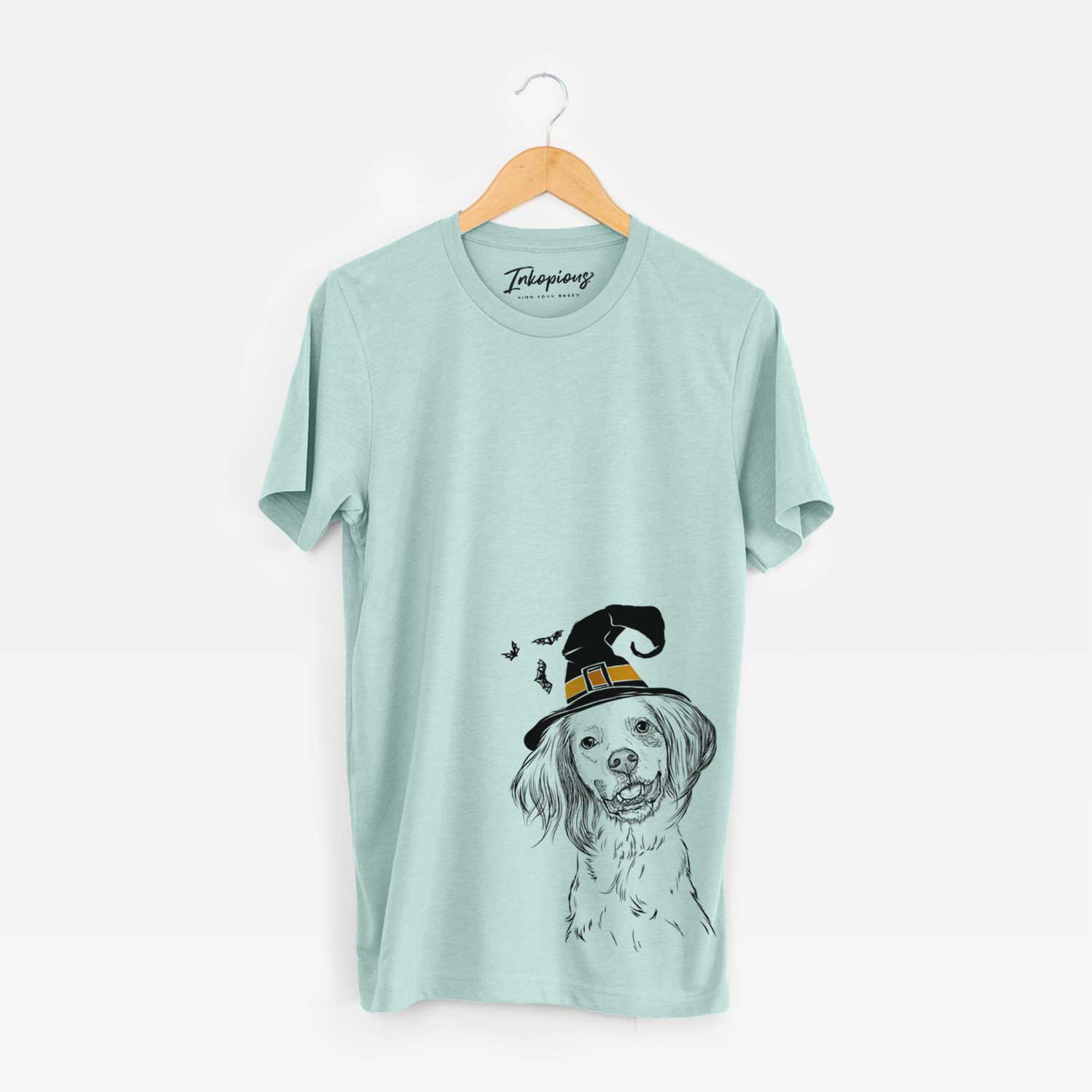 Hand-drawn sketch of Cooper the English Setter wearing a witch hat on a Heather Sage Unisex crewneck