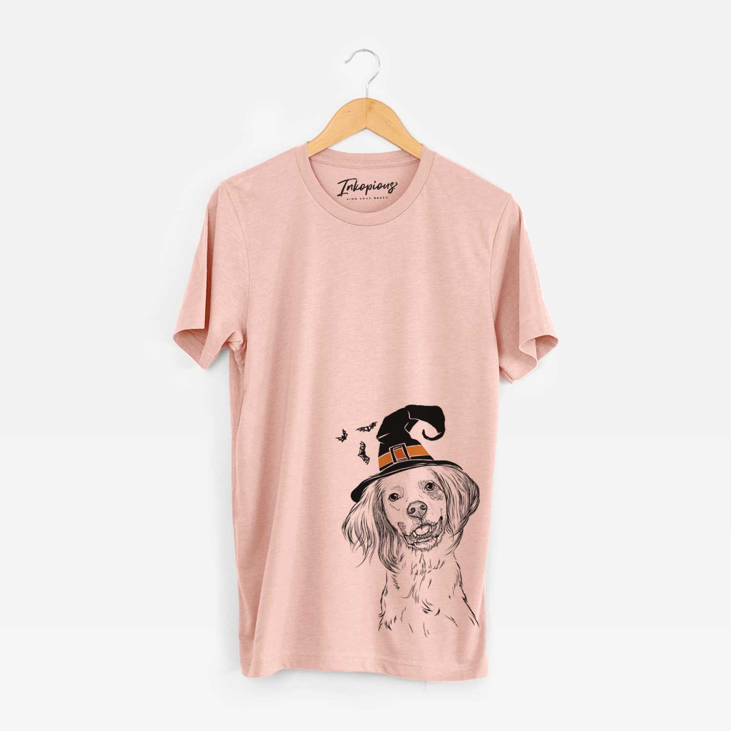 Hand-drawn sketch of Cooper the English Setter wearing a witch hat on a Peach Unisex crewneck
