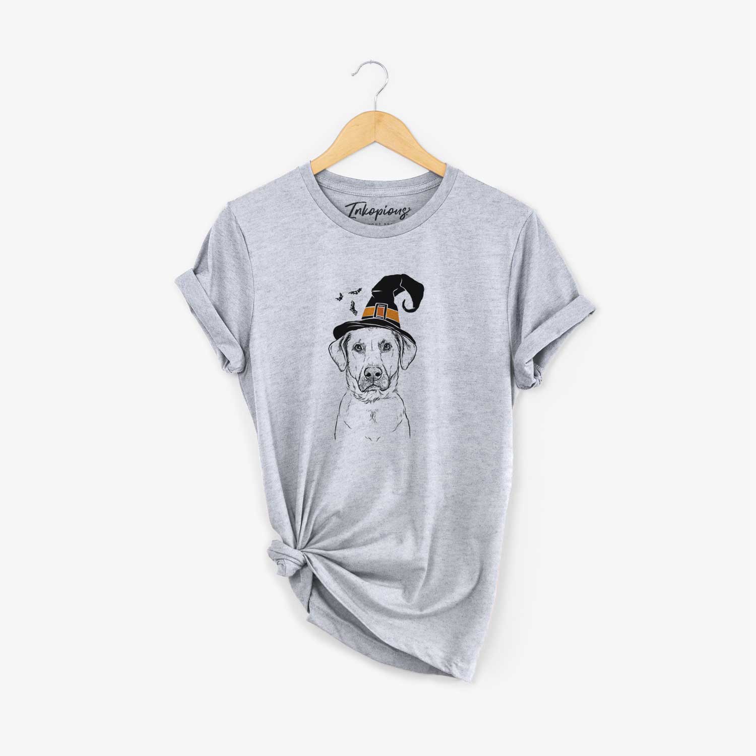 Hand-drawn sketch of Cooper Griffin the Mixed Breed wearing a witch hat on a Grey Unisex crewneck