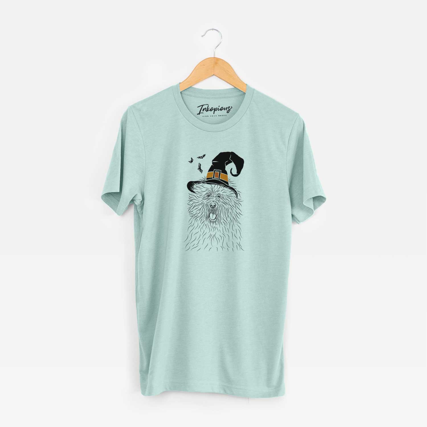 Hand-drawn sketch of Cozie the Old English Sheepdog wearing a witch hat on a Heather Sage Unisex crewneck