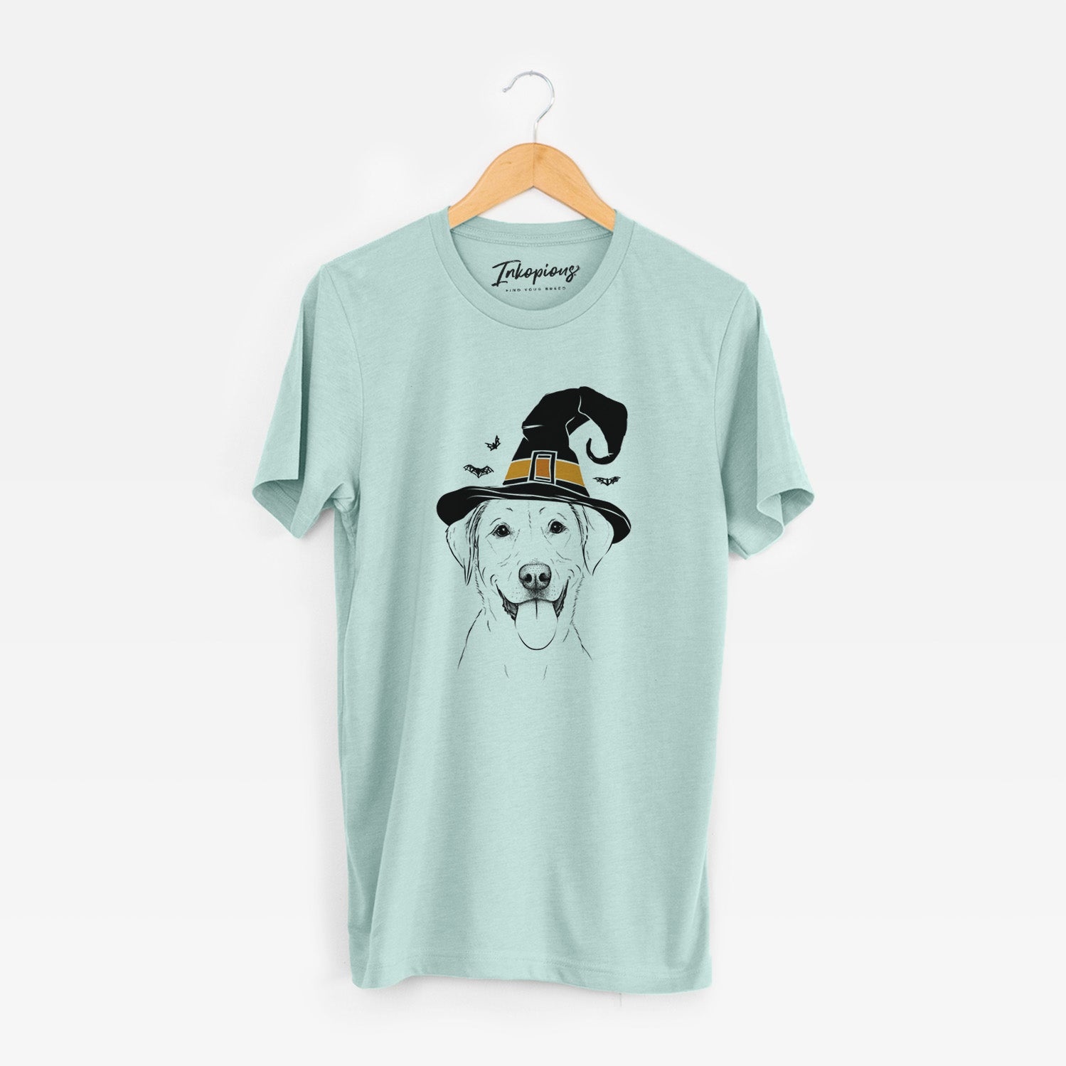 Hand-drawn sketch of Daisy the Labrador Retriever wearing a witch hat on a Heather Sage Unisex crewneck