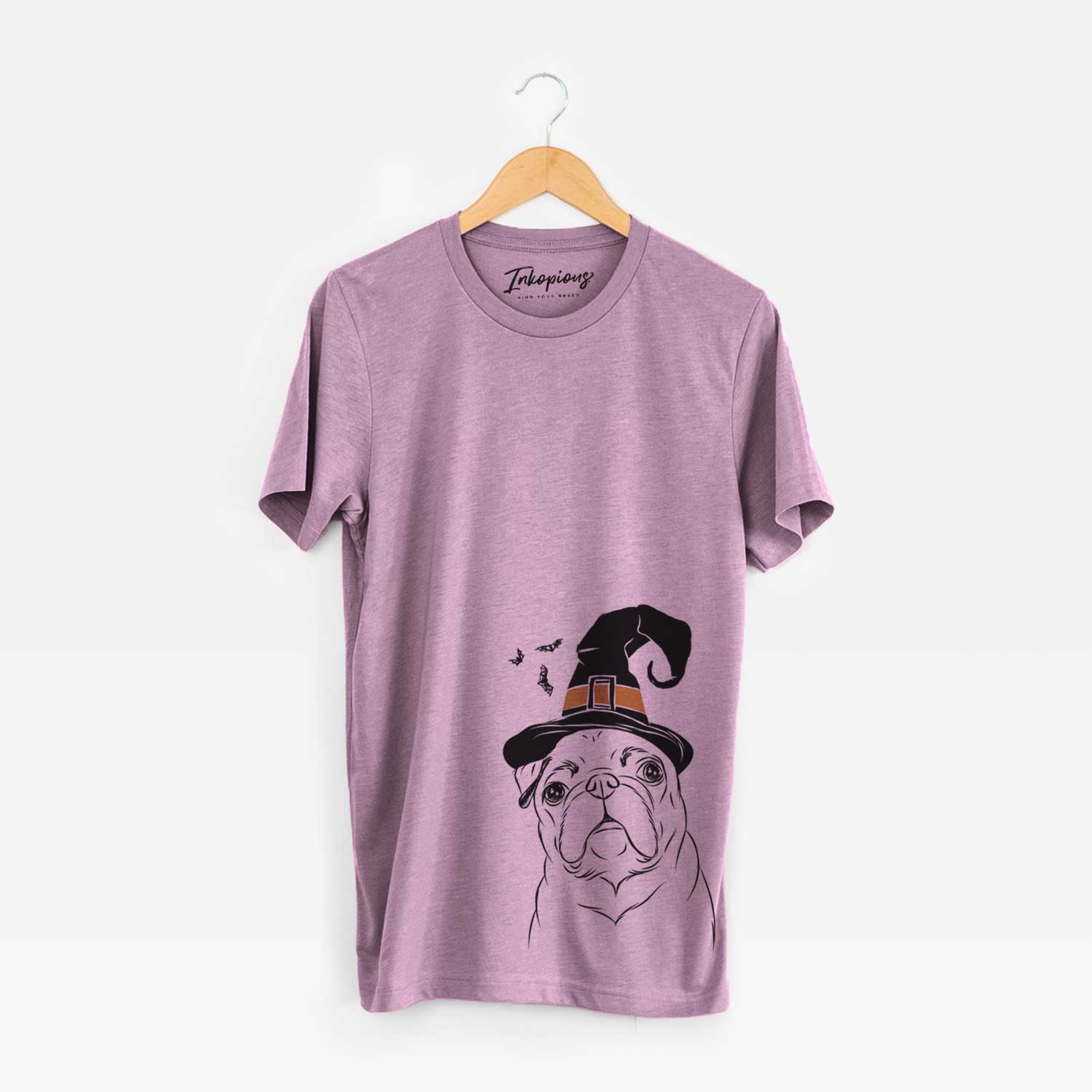 Hand-drawn sketch of Darling Chloe the Pug wearing a witch hat on an Orchid Unisex crewneck