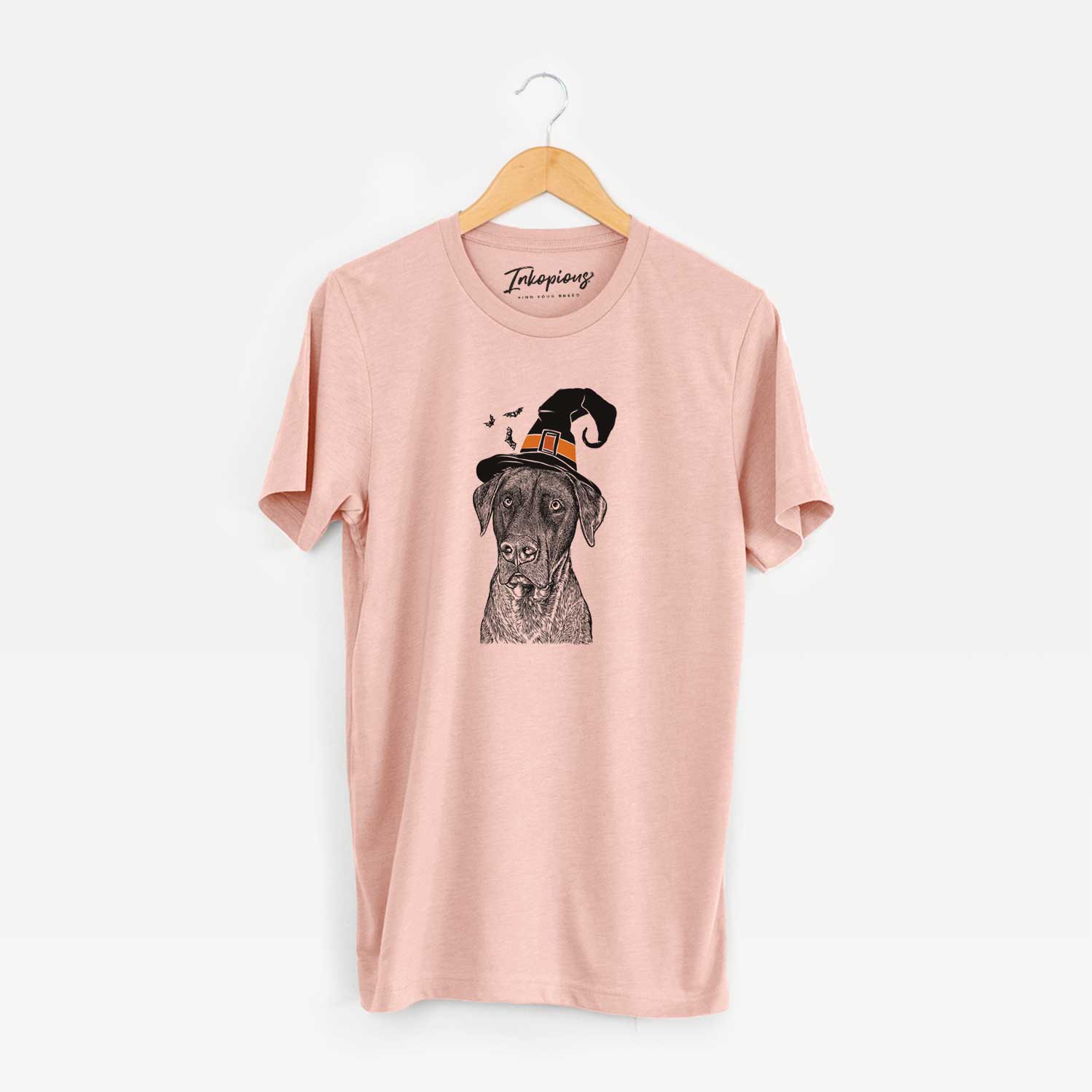 Hand-drawn sketch of David the Boxador wearing a witch hat on a Peach Unisex crewneck