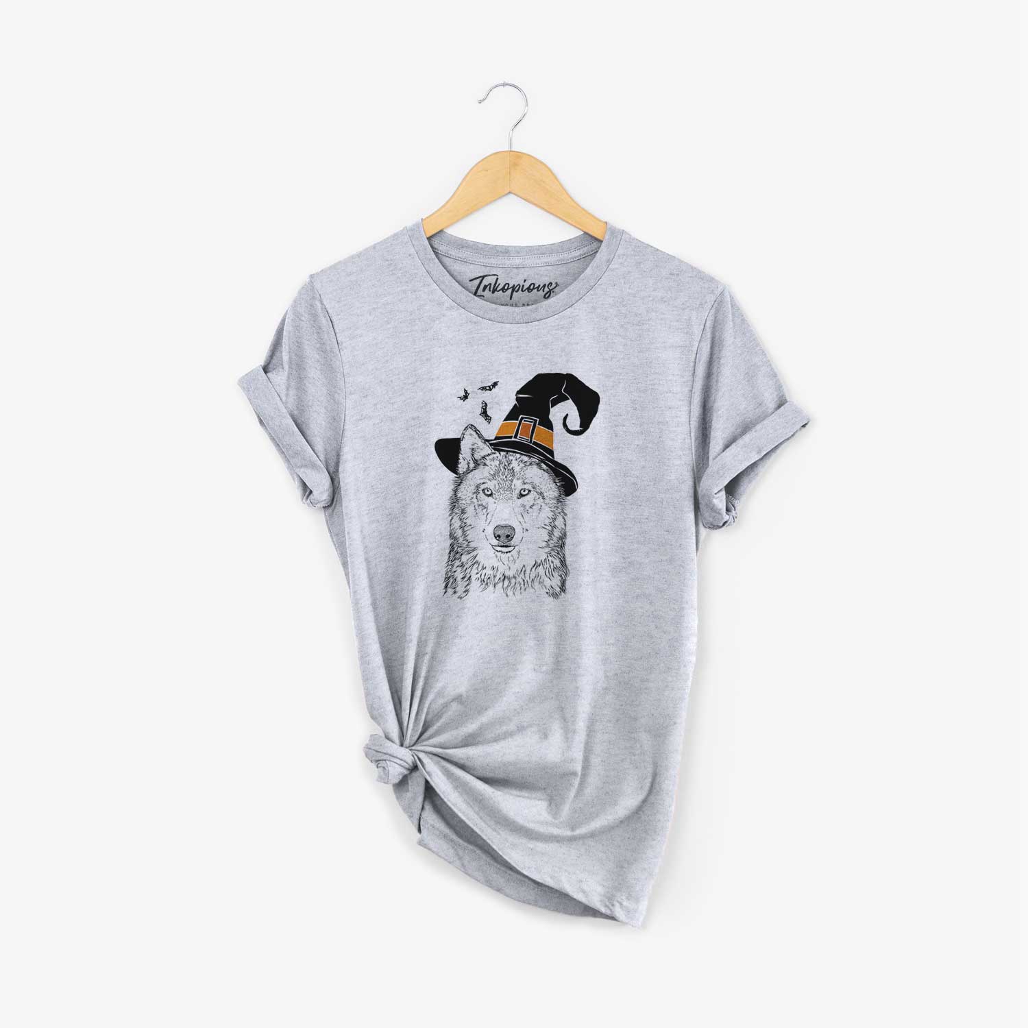 Hand-drawn sketch of Django the Grey Wolf wearing a witch hat on an Unisex crewneck