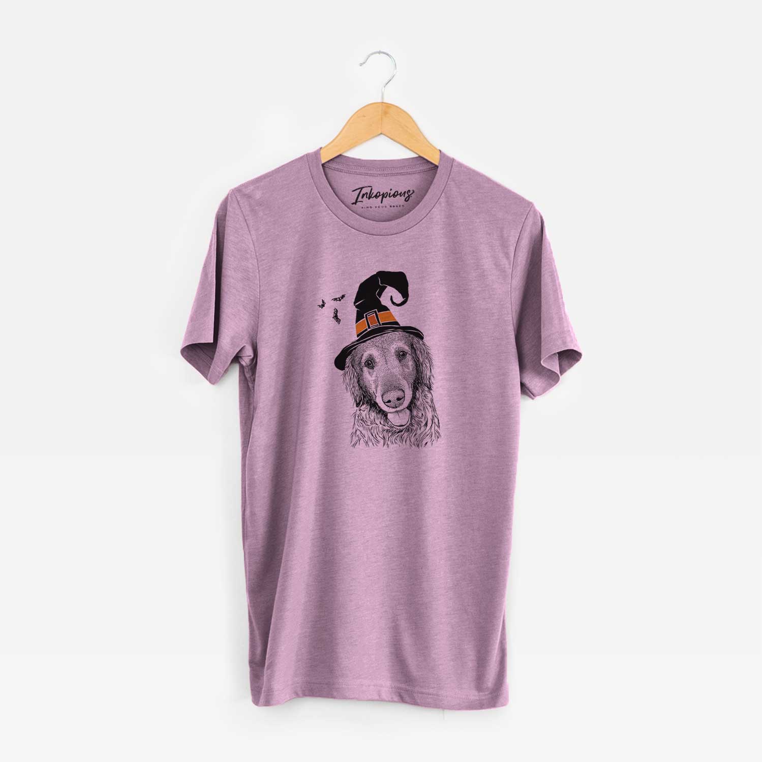 Hand-drawn sketch of Duncan the Golden Retriever wearing a witch hat on an Orchid Unisex crewneck