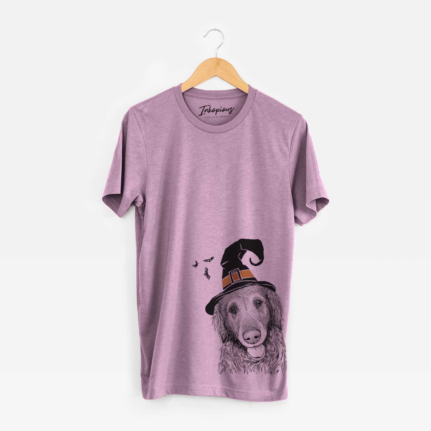 Hand-drawn sketch of Duncan the Golden Retriever wearing a witch hat on an Orchid Unisex crewneck