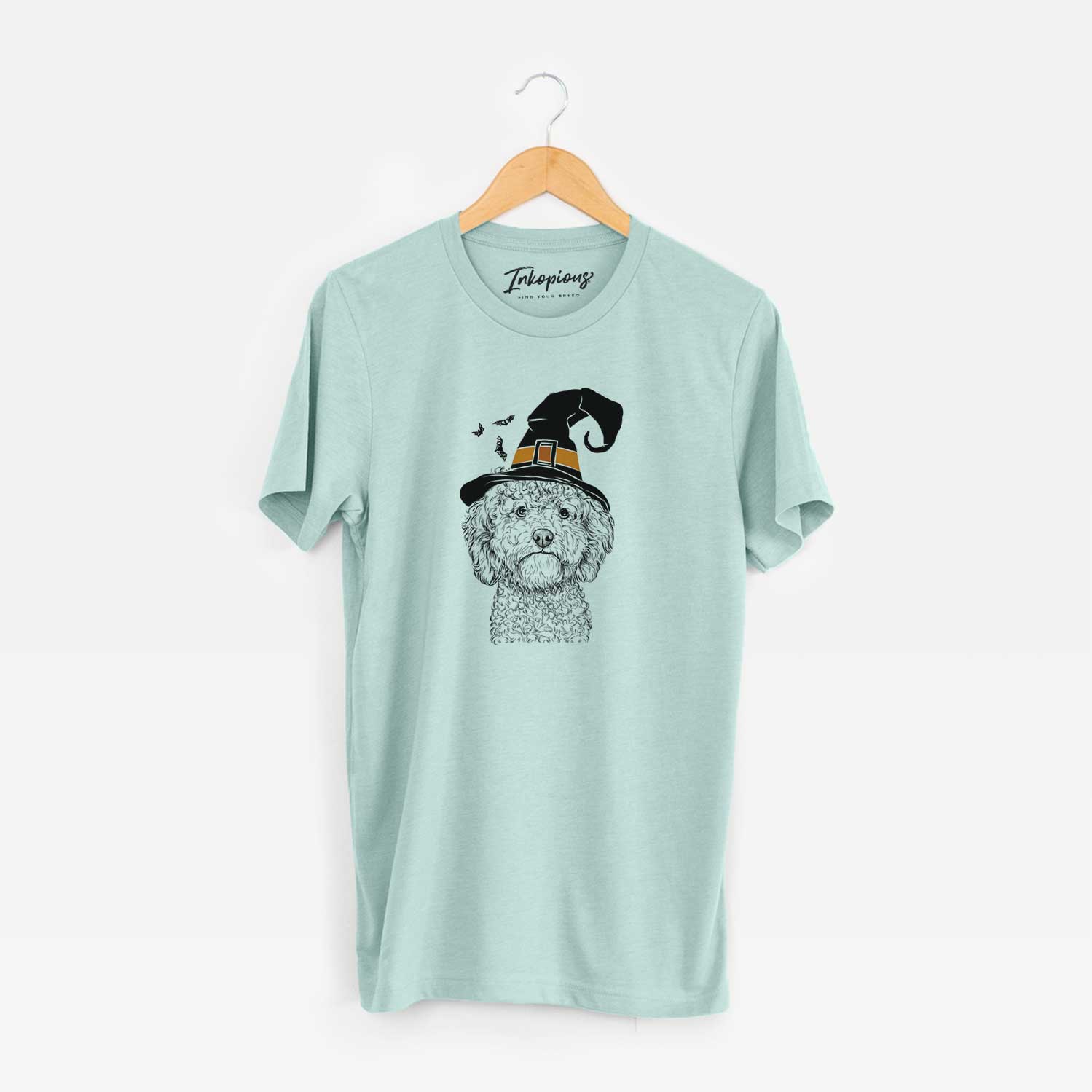 Hand-drawn sketch of Edgar the Shihpoo wearing a witch hat on a Heather Sage Unisex crewneck