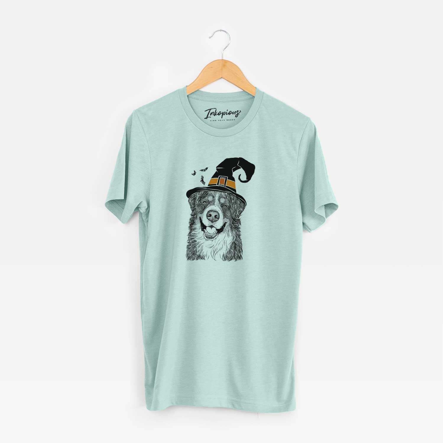 Hand-drawn sketch of Eiger the Bernese Mountain Dog wearing a witch hat on a Heather Sage Unisex crewneck