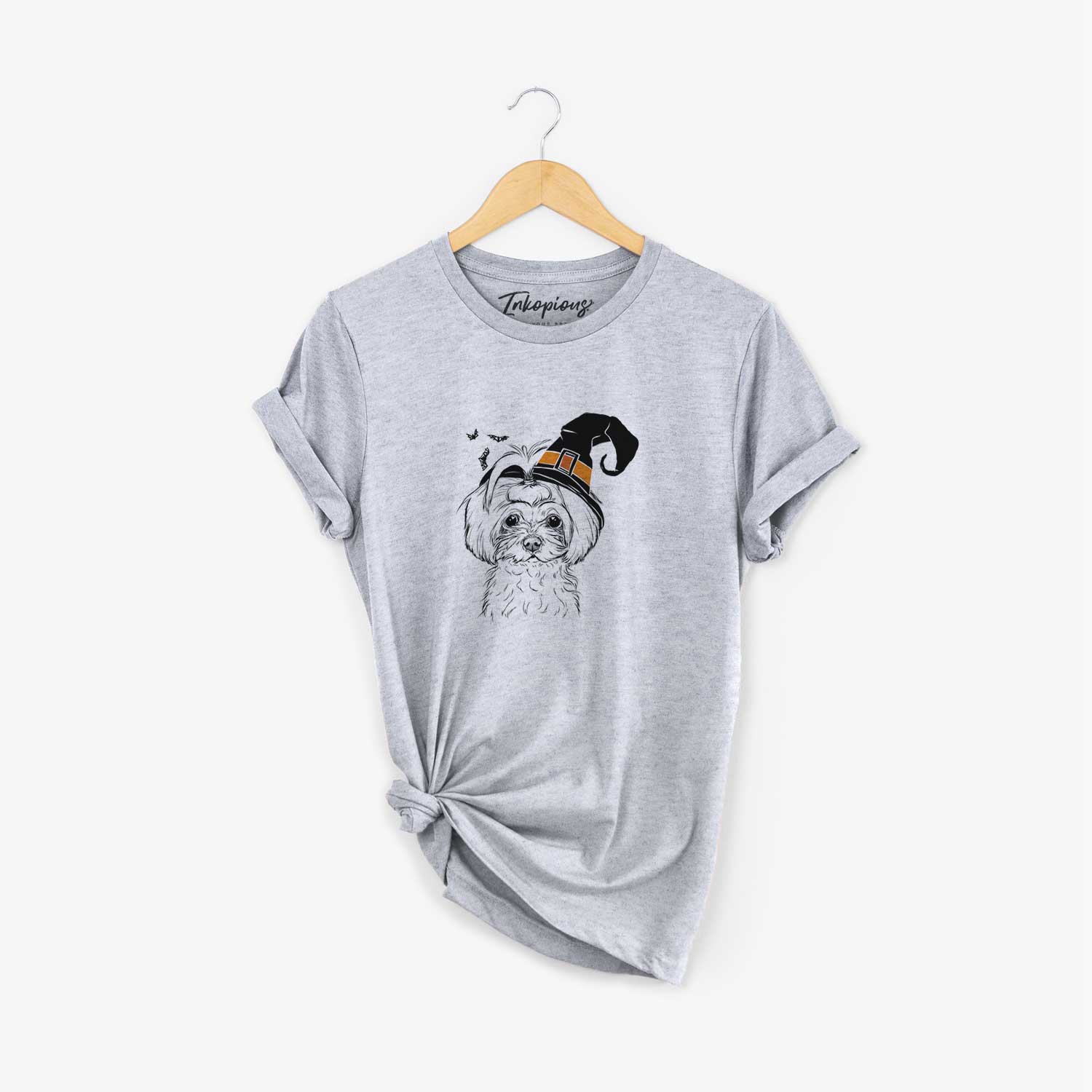 Hand-drawn sketch of Ellie the Maltese wearing a witch hat on a Grey Unisex crewneck