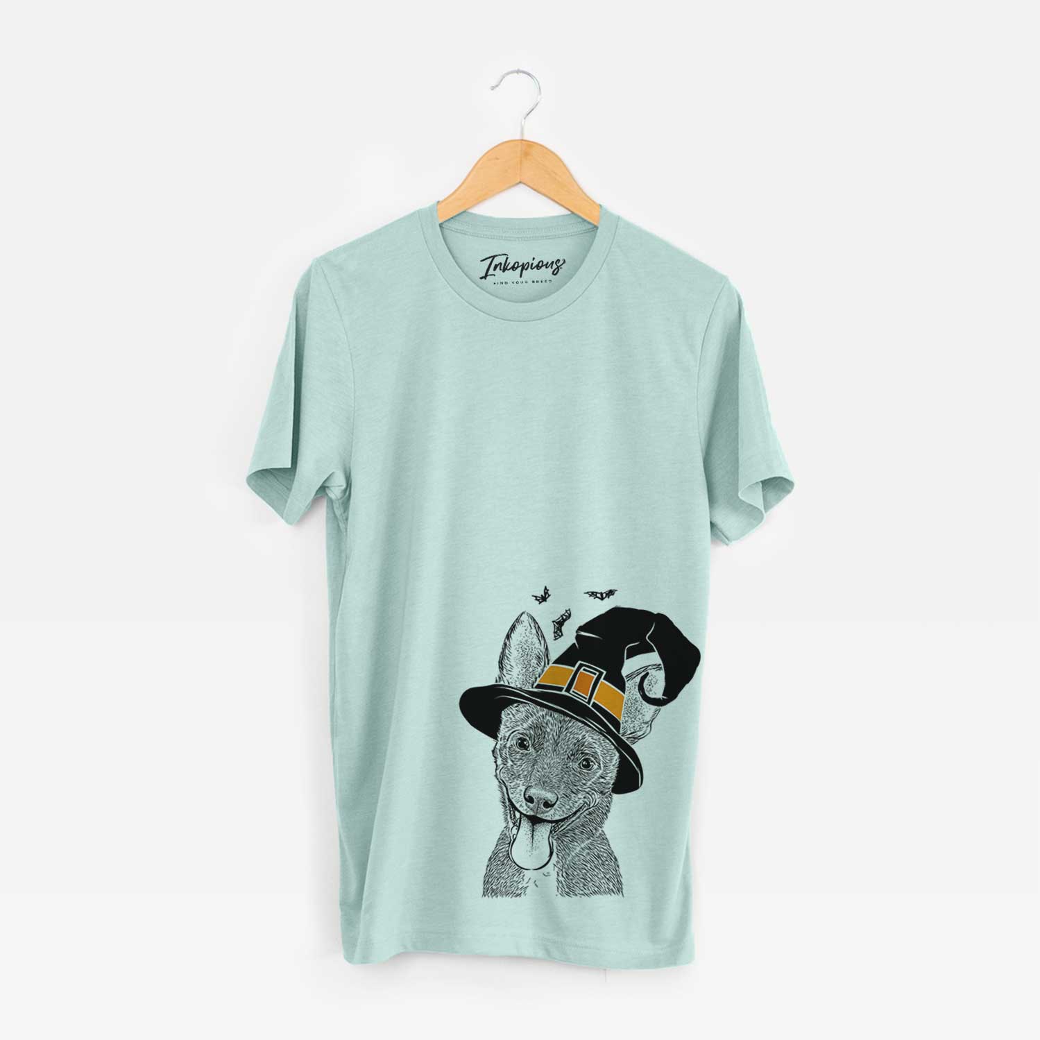 Hand-drawn sketch of Elvira the Terrier Mix wearing a witch hat on a Heather Sage Unisex crewneck