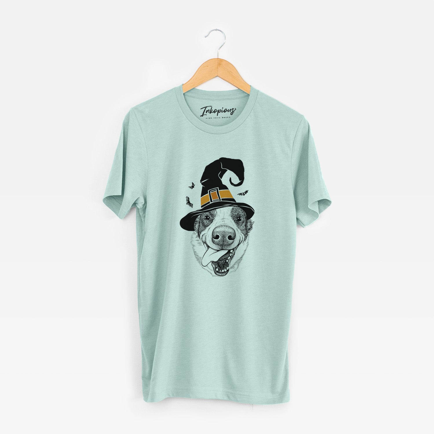 Hand-drawn sketch of Elwood the Border Collie wearing a witch hat on a Heather Sage Unisex crewneck
