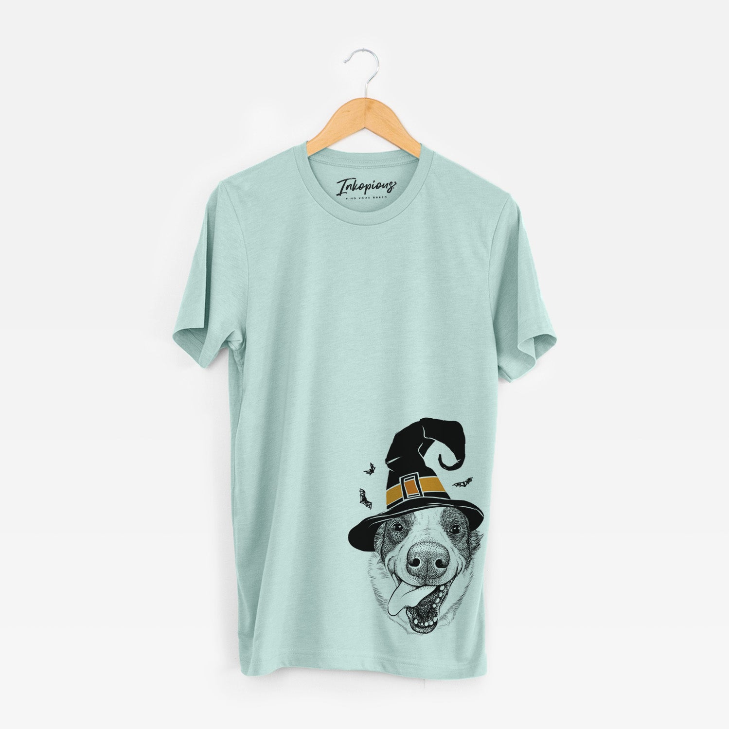 Hand-drawn sketch of Elwood the Border Collie wearing a witch hat on a Heather Sage Unisex crewneck
