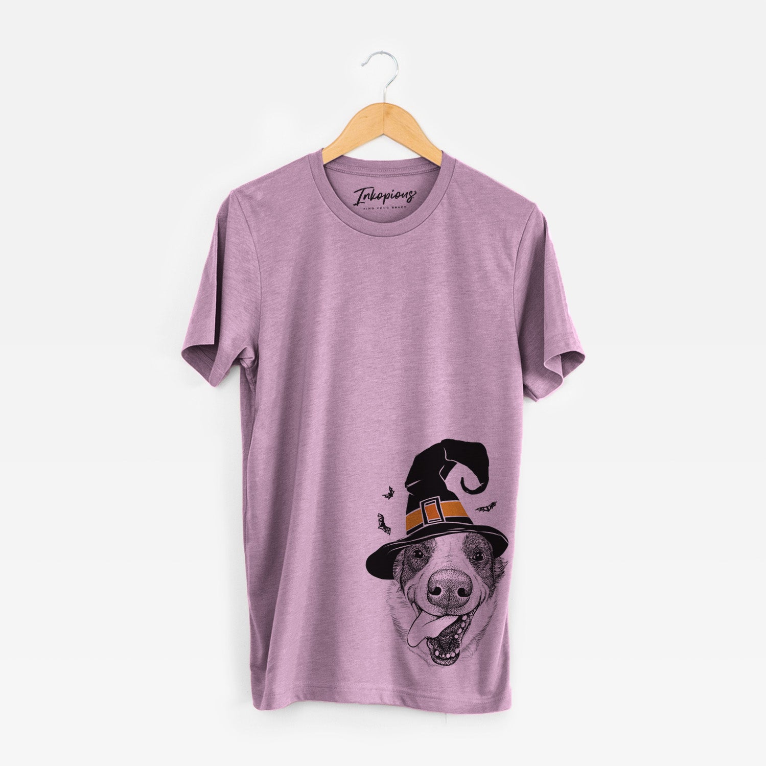 Hand-drawn sketch of Elwood the Border Collie wearing a witch hat on an Orchid Unisex crewneck