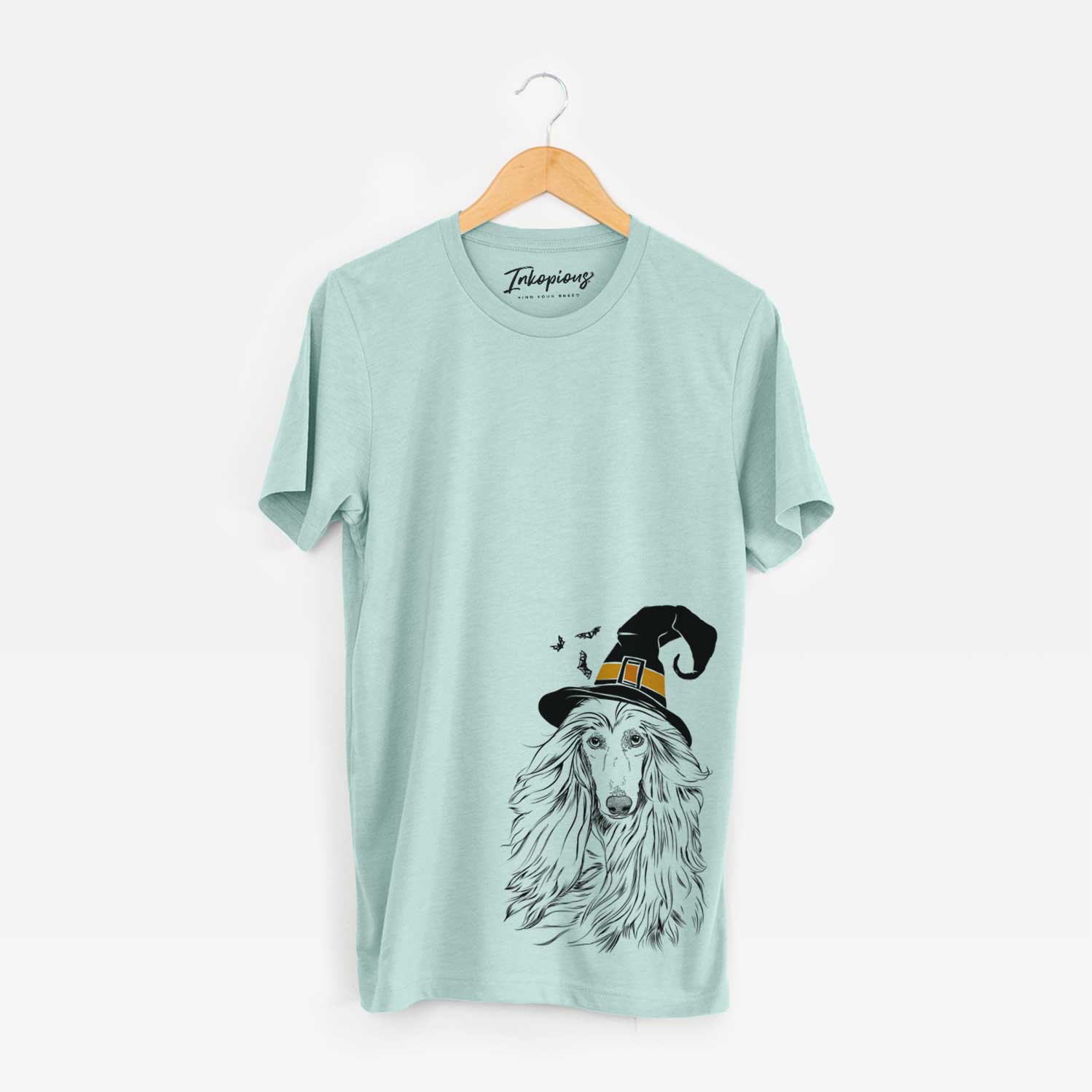 Hand-drawn sketch of Fabio the Afghan Hound wearing a witch hat on a Heather Sage Unisex crewneck