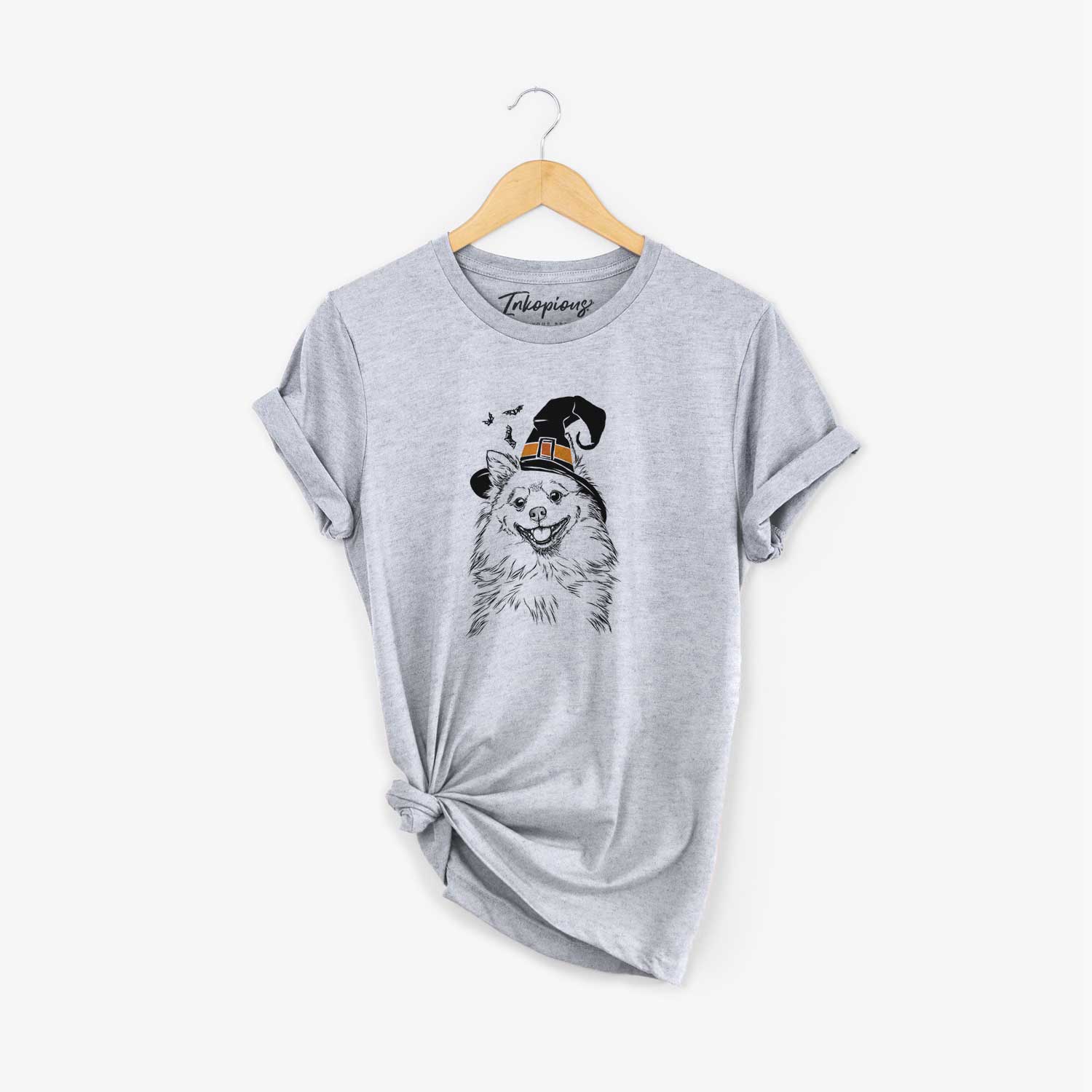 Hand-drawn sketch of Fibi the Spitz wearing a witch hat on a Grey Unisex crewneck