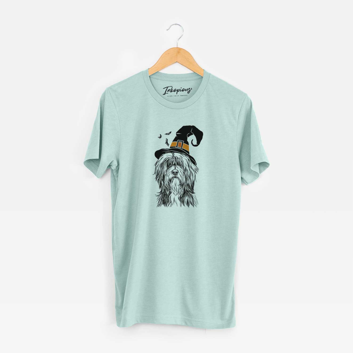Hand-drawn sketch of Fiji the Polish Lowland Sheepdog wearing a witch hat on a Heather Sage Unisex crewneck