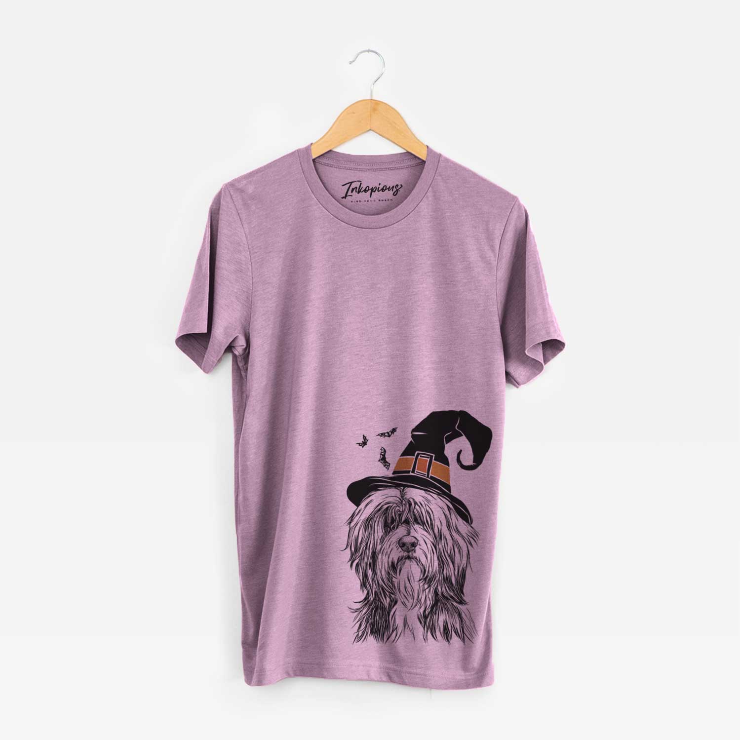Hand-drawn sketch of Fiji the Polish Lowland Sheepdog wearing a witch hat on an Orchid Unisex crewneck