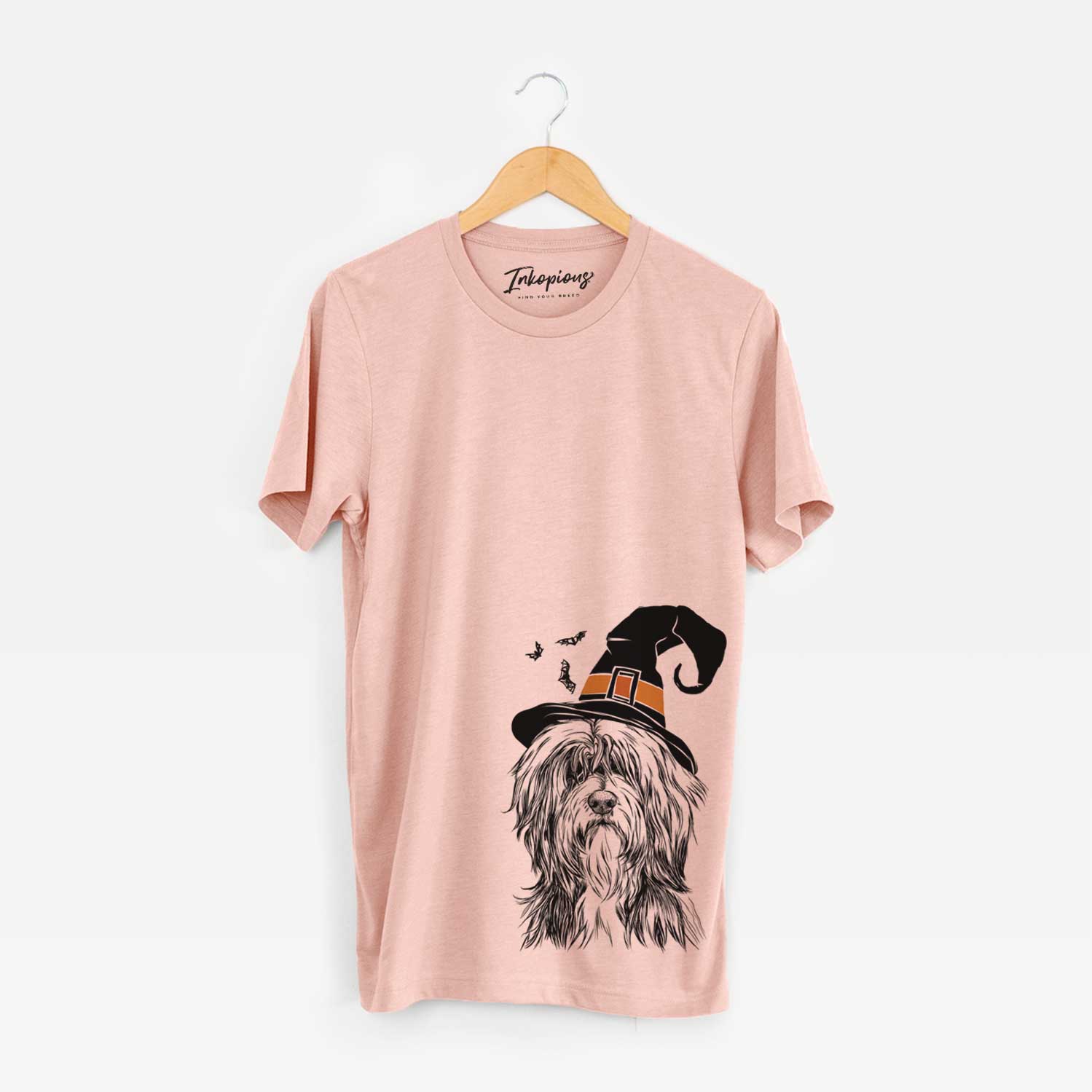 Hand-drawn sketch of Fiji the Polish Lowland Sheepdog wearing a witch hat on a Peach Unisex crewneck