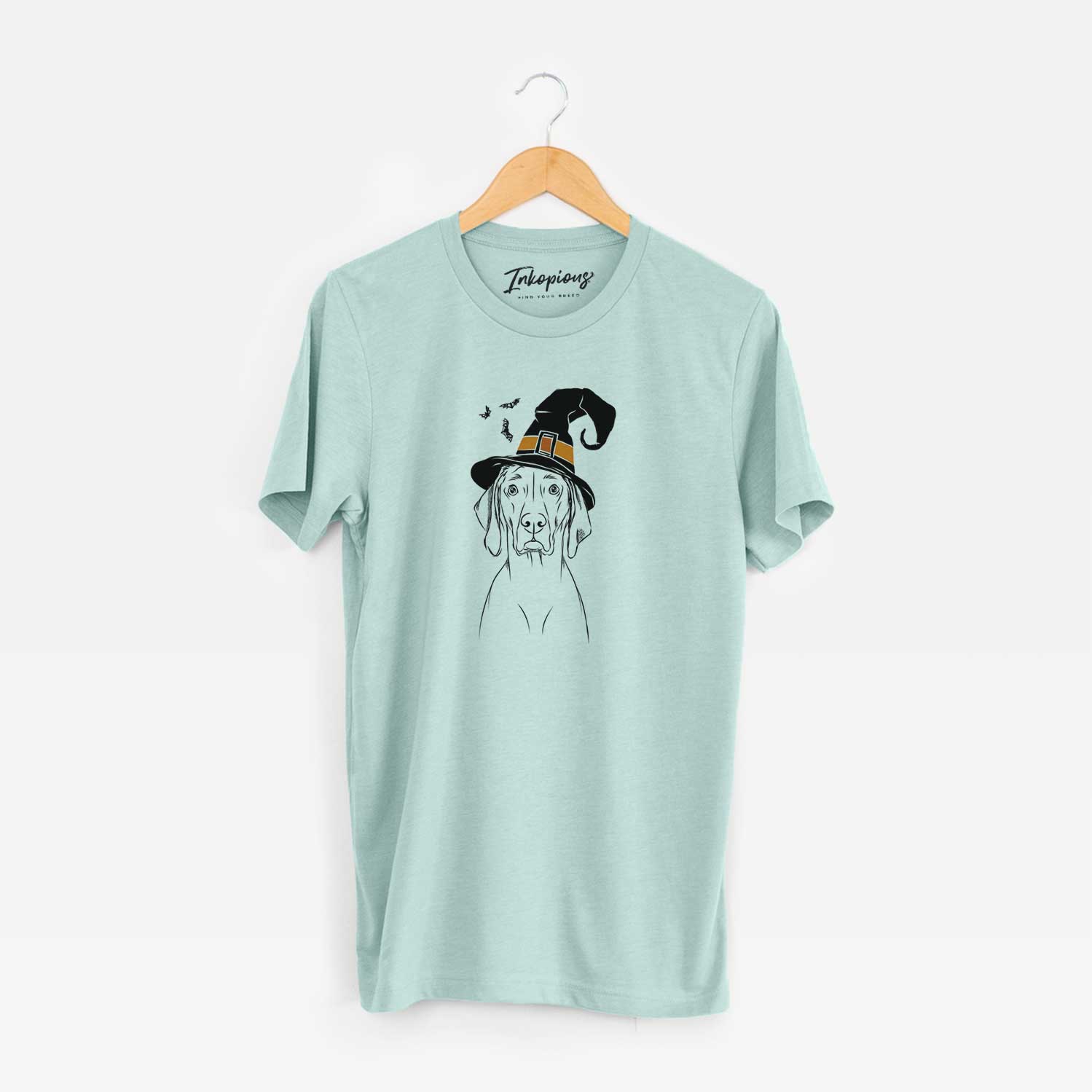 Hand-drawn sketch of Flint the Weimaraner wearing a witch hat on a Heather Sage Unisex crewneck