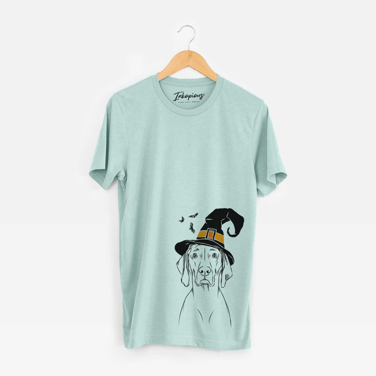 Hand-drawn sketch of Flint the Weimaraner wearing a witch hat on a Heather Sage Unisex crewneck