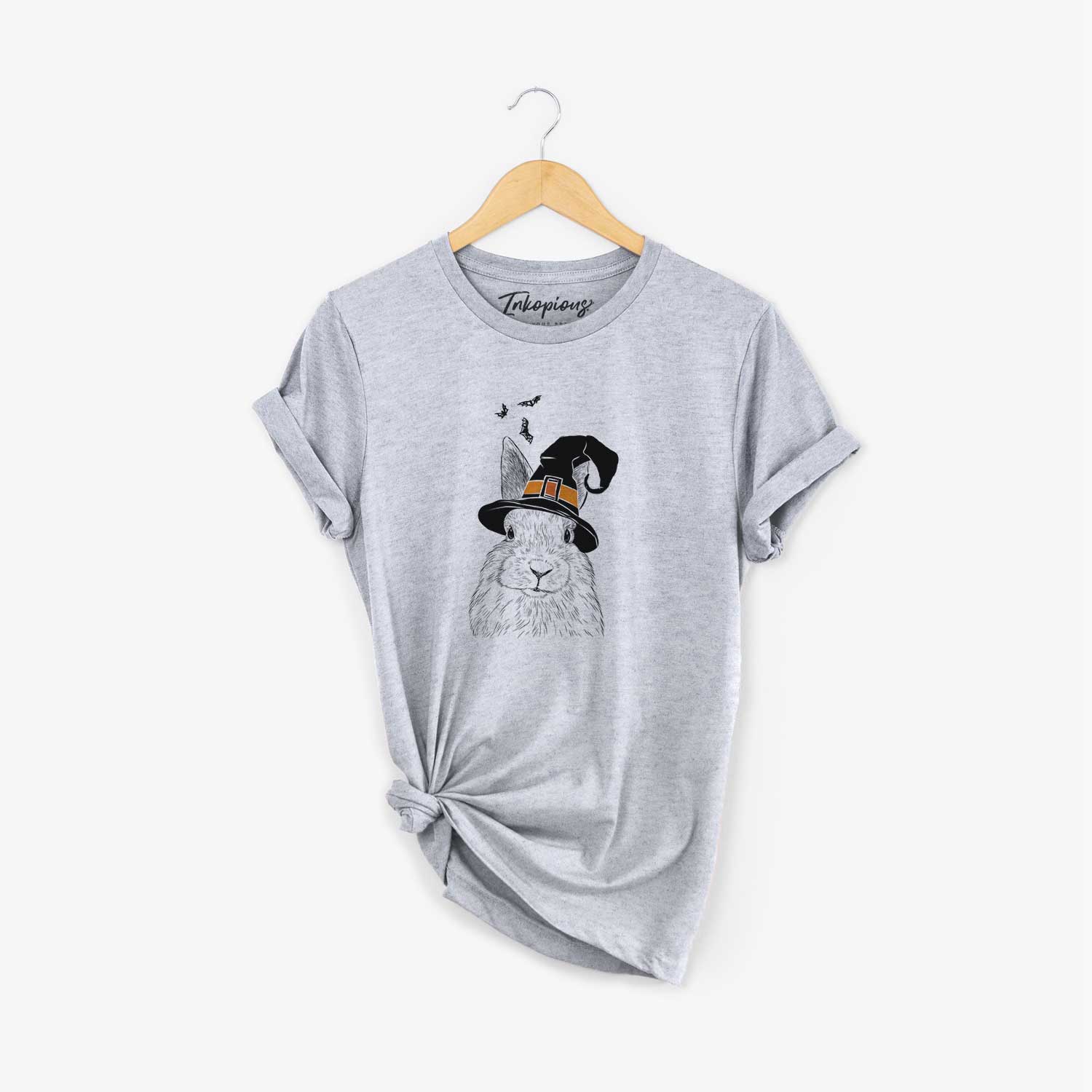 Hand-drawn sketch of Flower the Rex Rabbit wearing a witch hat on a Grey Unisex crewneck