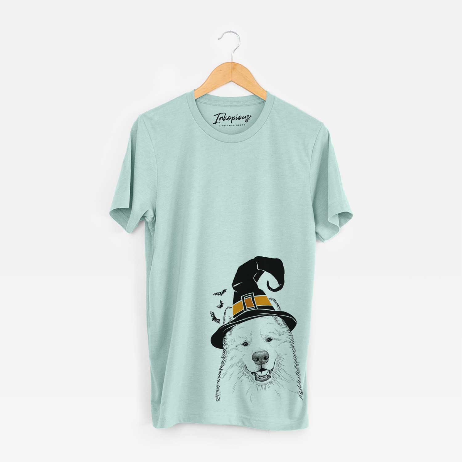 Hand-drawn sketch of Foster the Samoyed wearing a witch hat on a Heather Sage Unisex crewneck