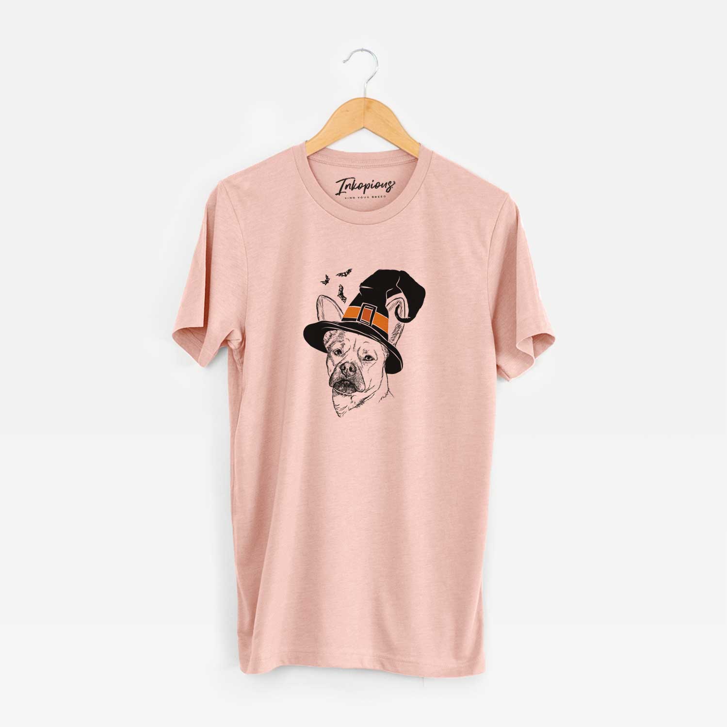 Hand-drawn sketch of Frankie the Mixed Breed wearing a witch hat on a Peach Unisex crewneck