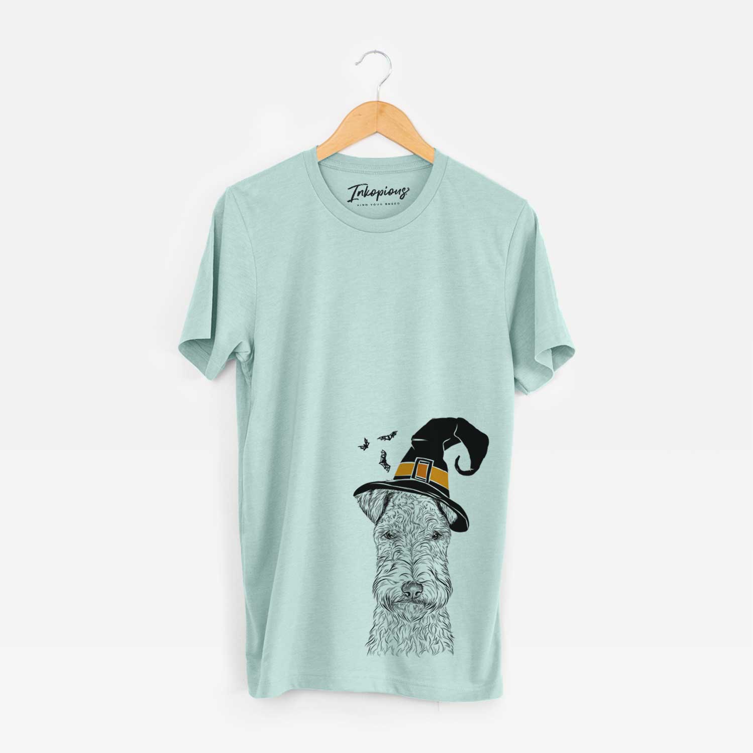 Hand-drawn sketch of Frida the Lakeland Terrier wearing a witch hat on a Heather Sage Unisex crewneck