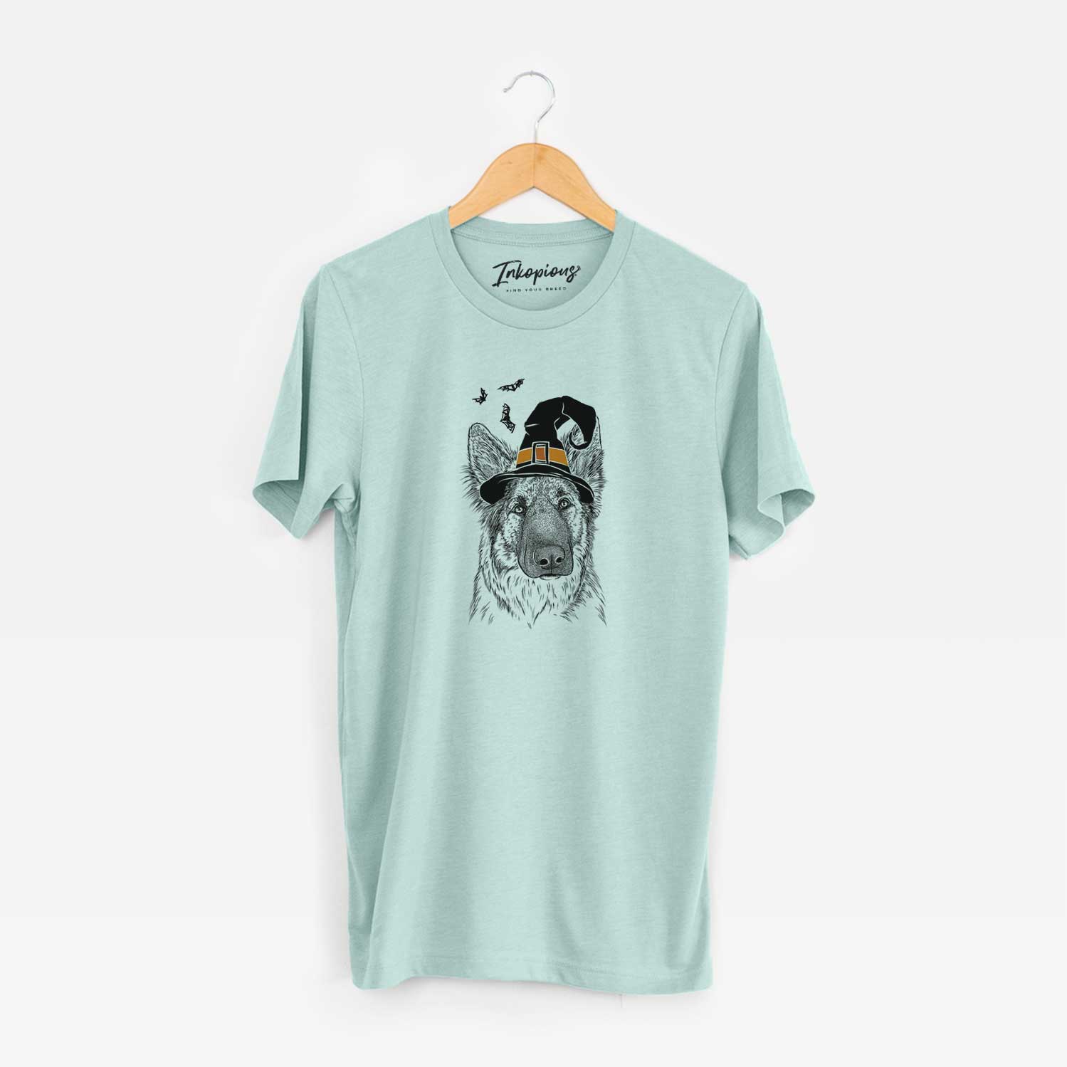 Hand-drawn sketch of Geddy the Shiloh Shepherd wearing a witch hat on a Heather Sage Unisex crewneck