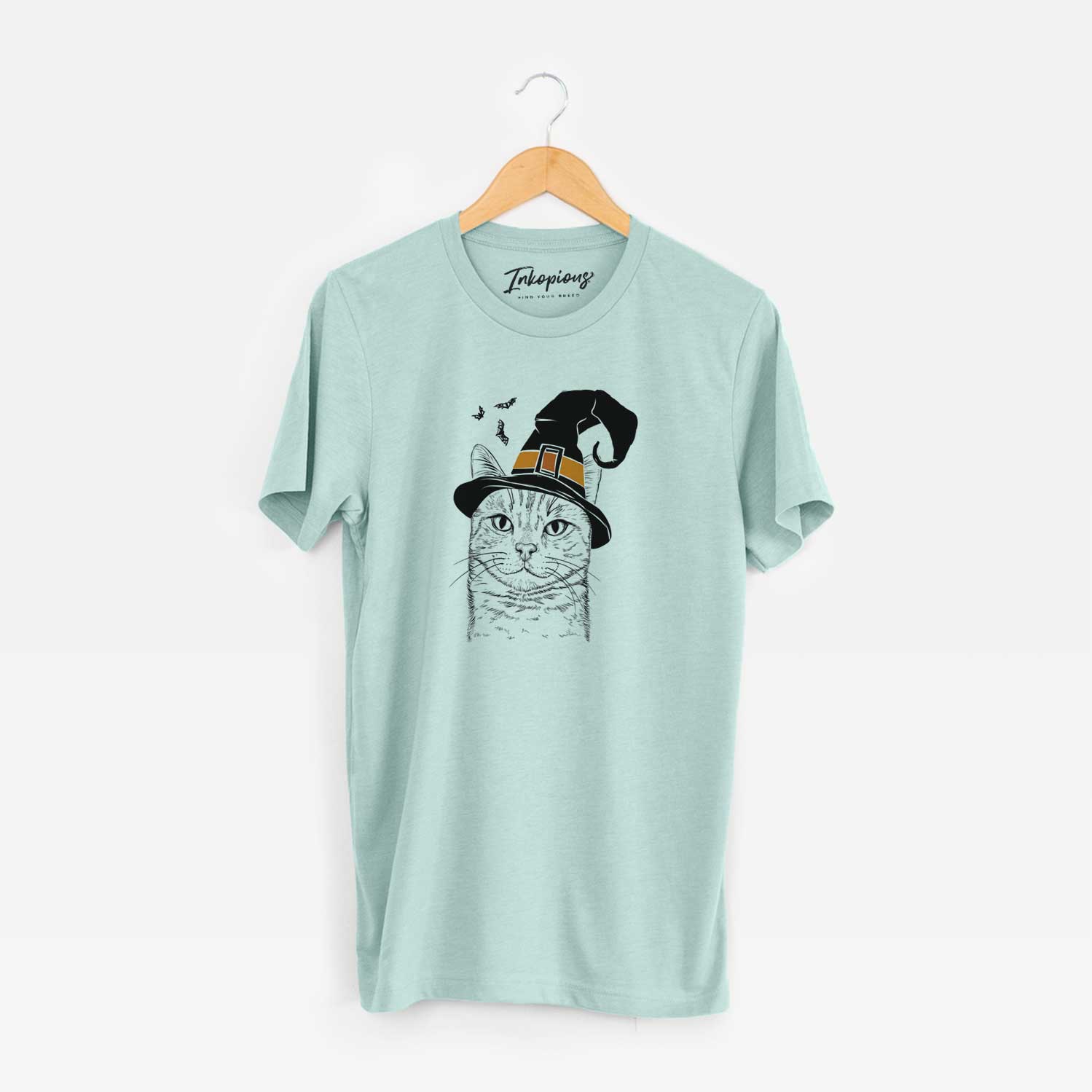 Hand-drawn sketch of Ginger Tom the Tabby Cat wearing a witch hat on a Heather Sage Unisex crewneck