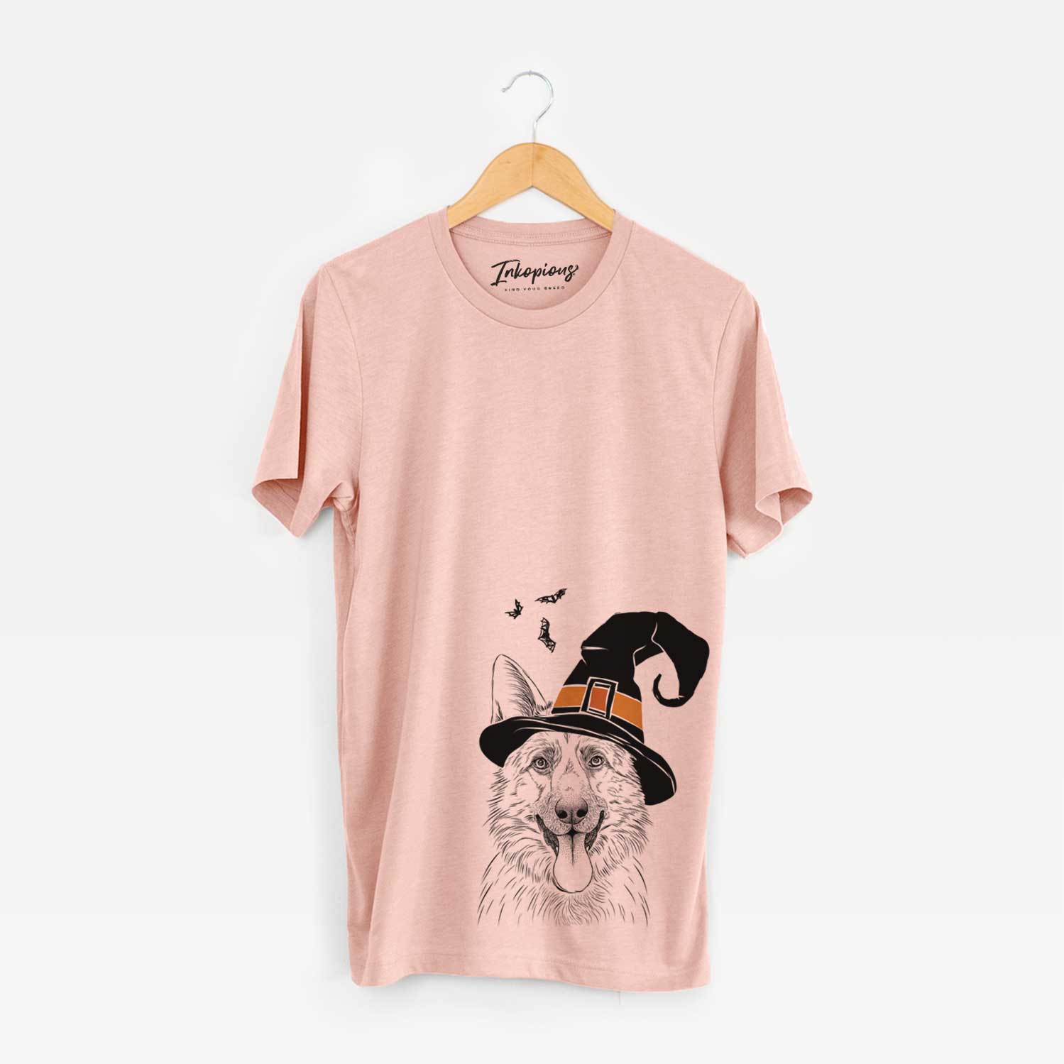 Hand-drawn sketch of Grace the German Shepherd wearing a witch hat on a Peach Unisex crewneck