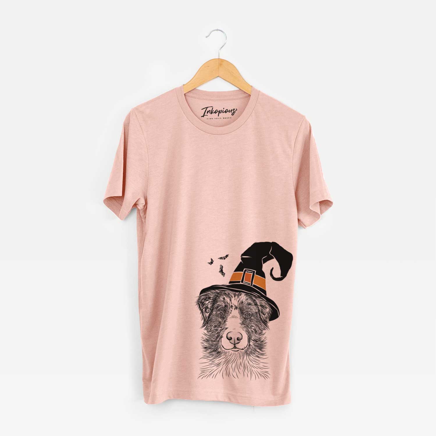 Hand-drawn sketch of Gram the Australian Shepherd wearing a witch hat on a Peach Unisex crewneck