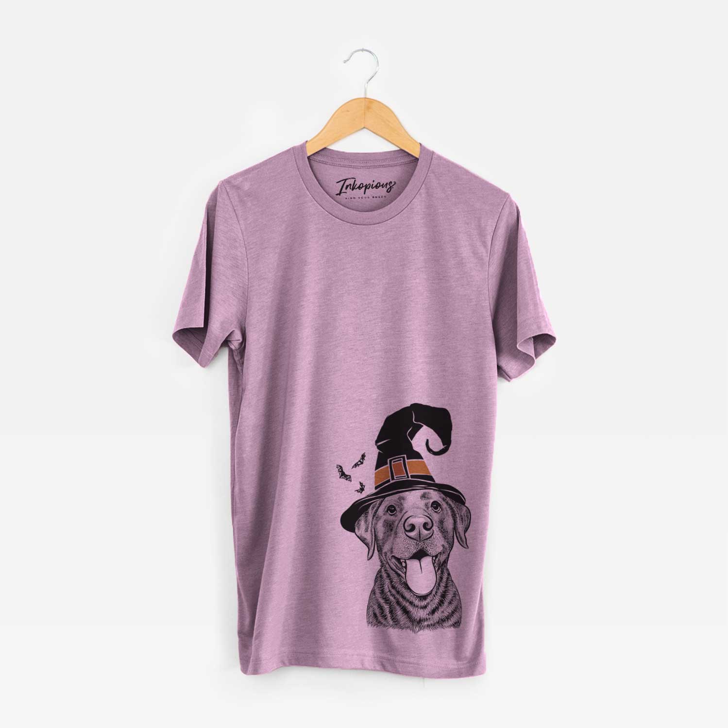 Hand-drawn sketch of Gwen the Labrador Retriever wearing a witch hat on an Orchid Unisex crewneck