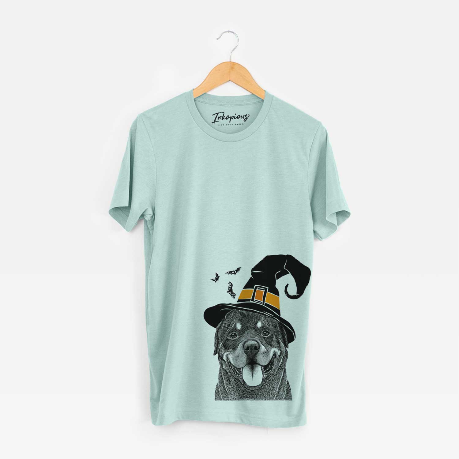 Hand-drawn sketch of Hagan the Rottweiler wearing a witch hat on a Heather Sage Unisex crewneck