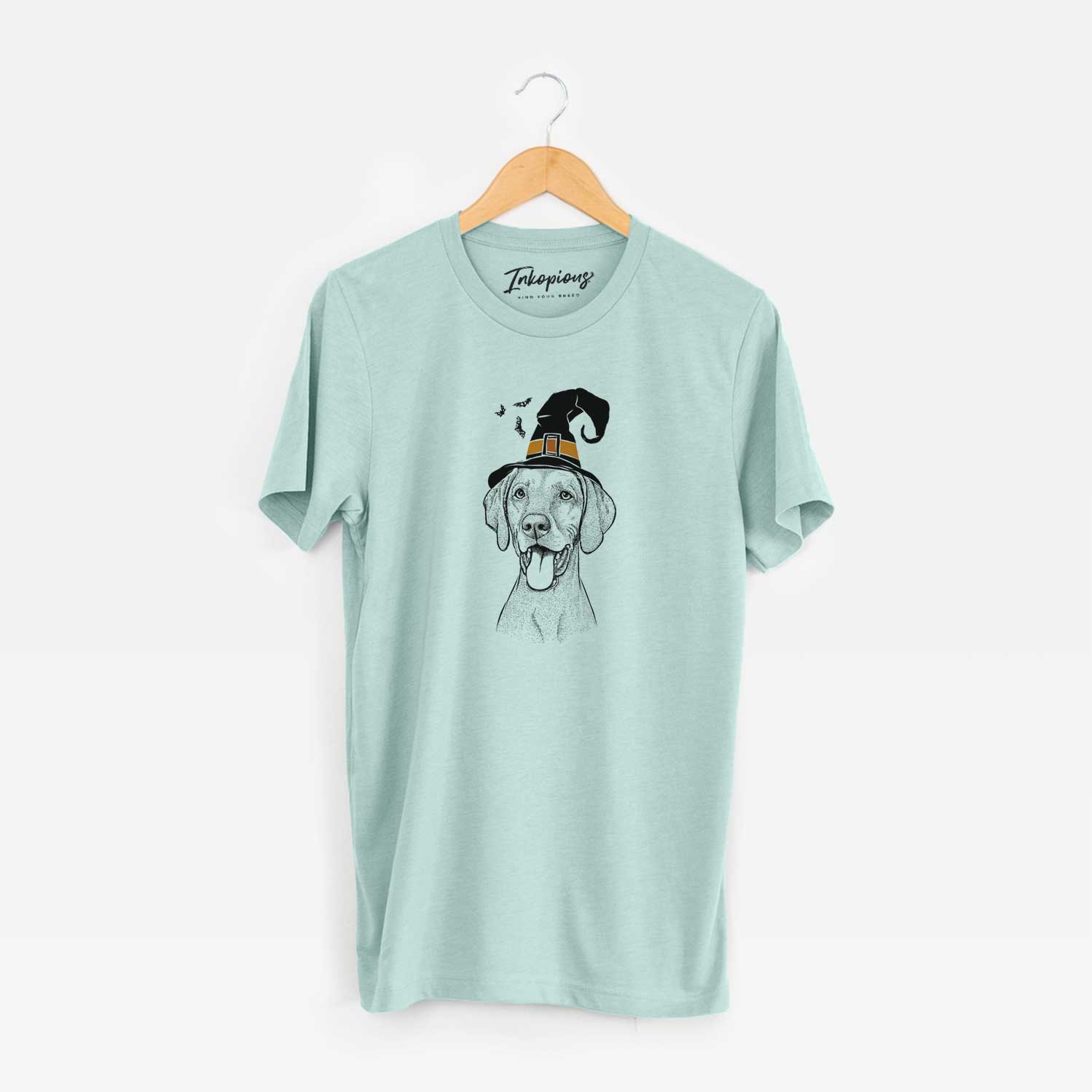 Hand-drawn sketch of Harper the Vizsla wearing a witch hat on a Heather Sage Unisex crewneck