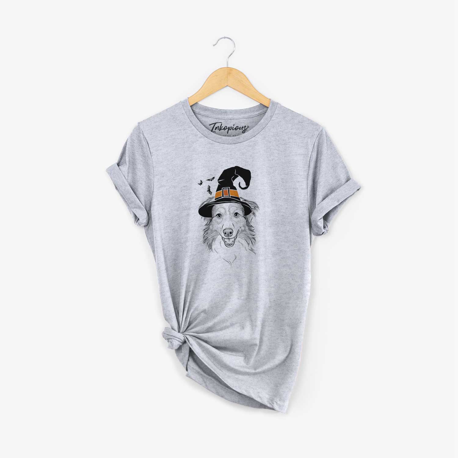 Hand-drawn sketch of Hattie the Australian Shepherd wearing a witch hat on a Grey Unisex crewneck