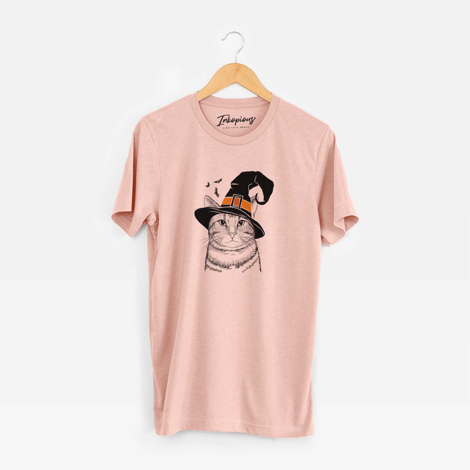 Hand-drawn sketch of Henry the Bengal wearing a witch hat on a Peach Unisex crewneck