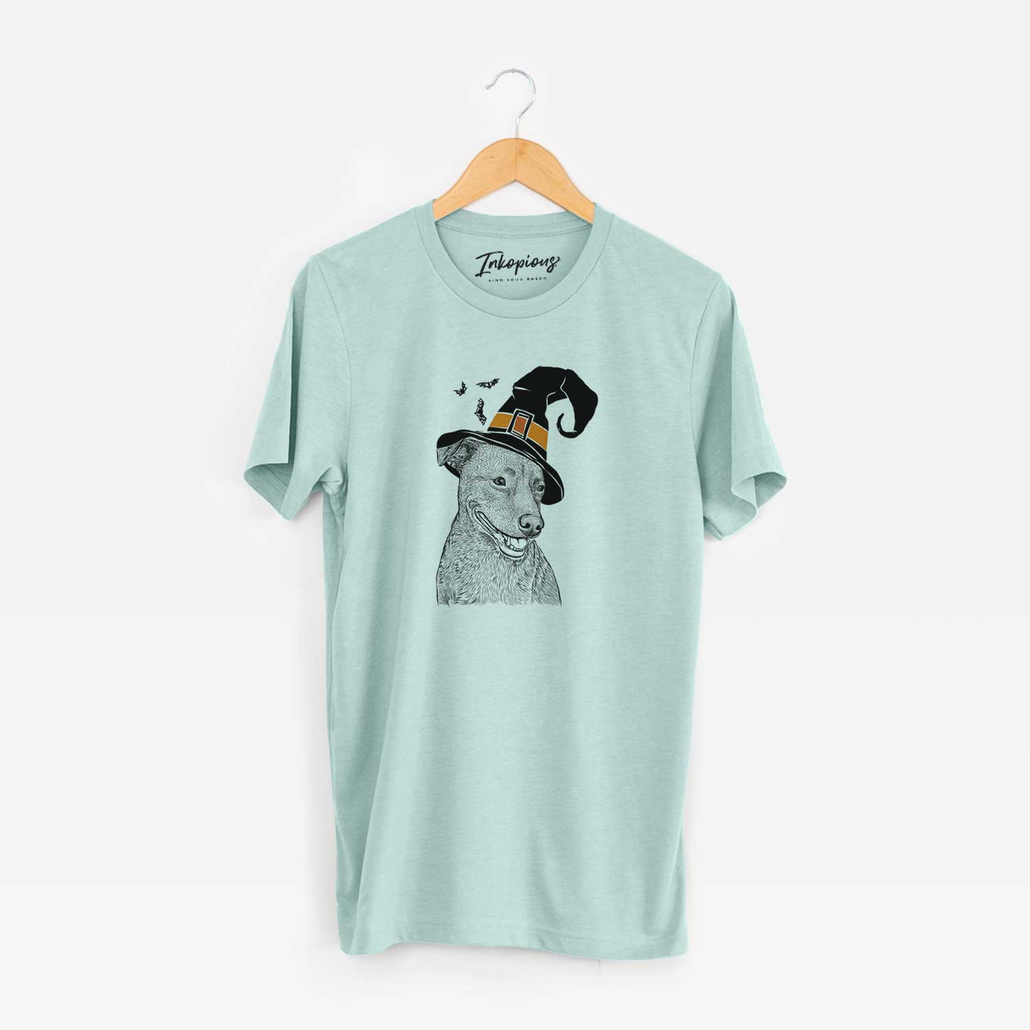 Hand-drawn sketch of Honey the Lab Pit Mix wearing a witch hat on a Heather Sage Unisex crewneck
