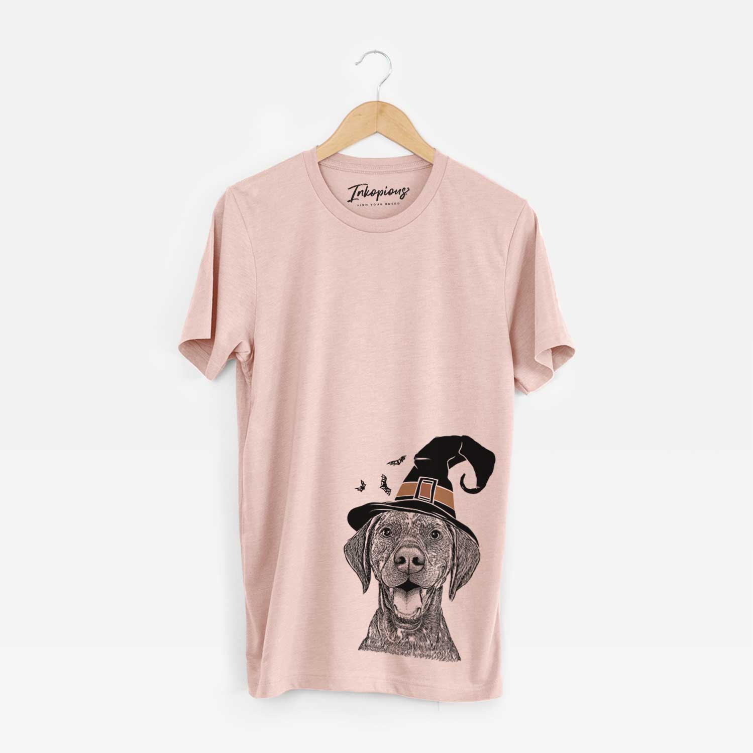 Hand-drawn sketch of Hudson the German Shorthaired Pointer wearing a witch hat on a Peach Unisex crewneck