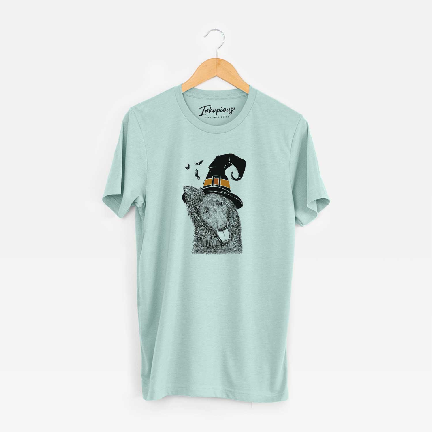 Hand-drawn sketch of Jaxx the Belgian Tervuren wearing a witch hat on a Heather Sage Unisex crewneck